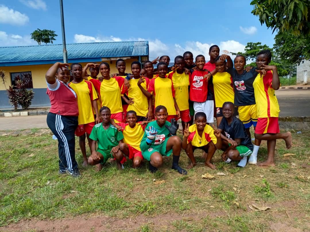 Female_Football_Team_Pose_For_Picture.jpg