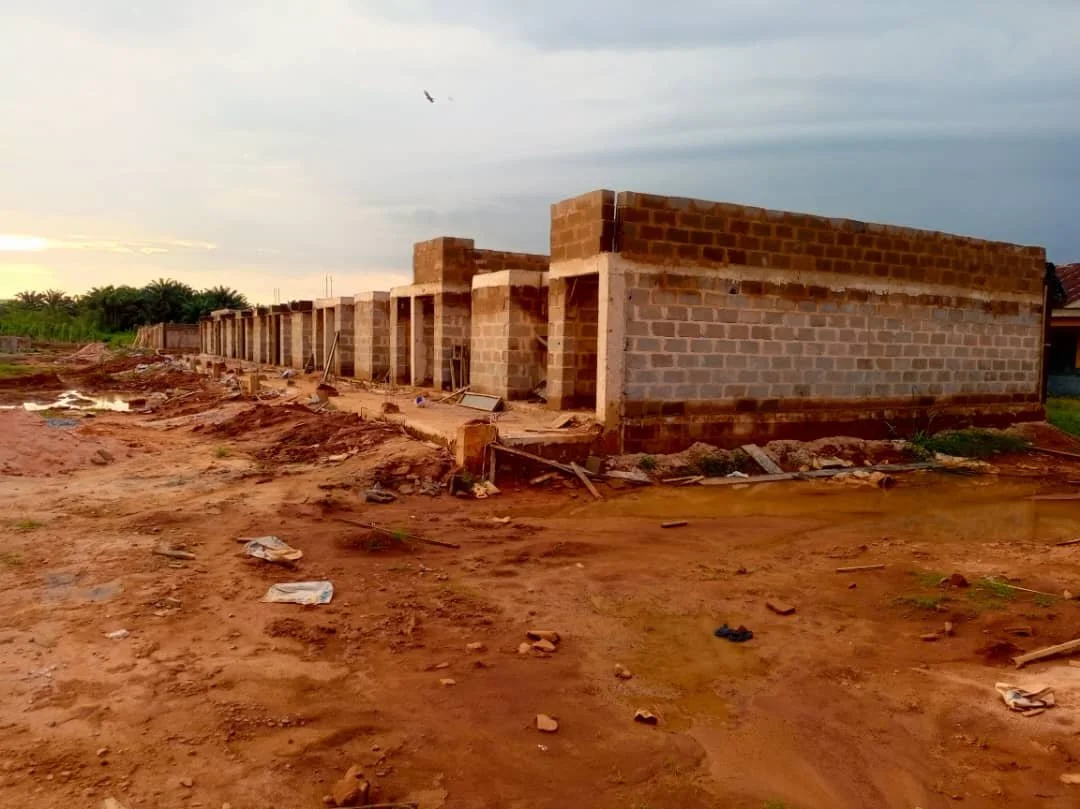 First block of six classrooms lintel work completed, blocks to roofing level being added.