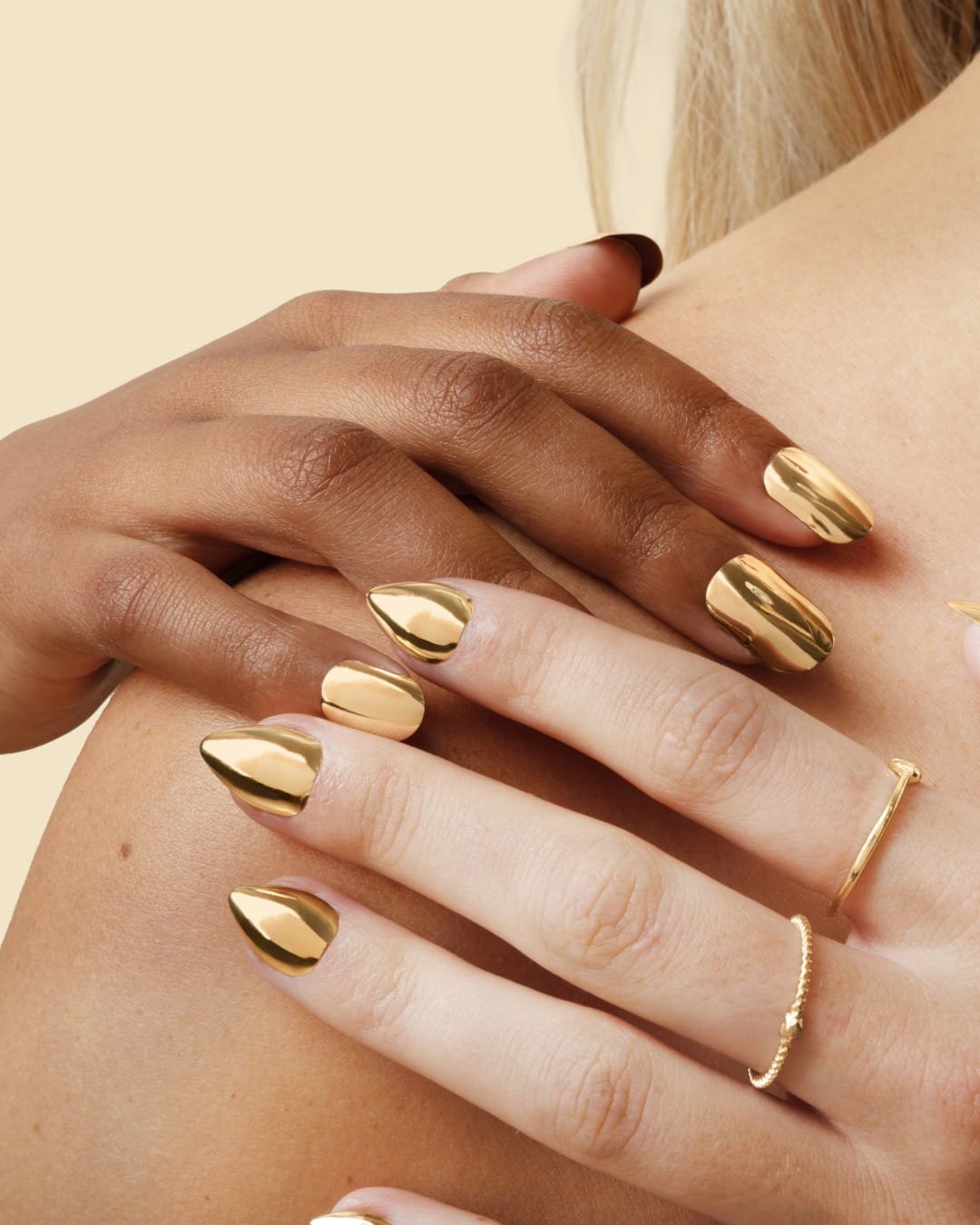 Gold looks great on everyone.

That's exactly the point.

&mdash;

Not plated or nail polish, pure 14k gold nails.