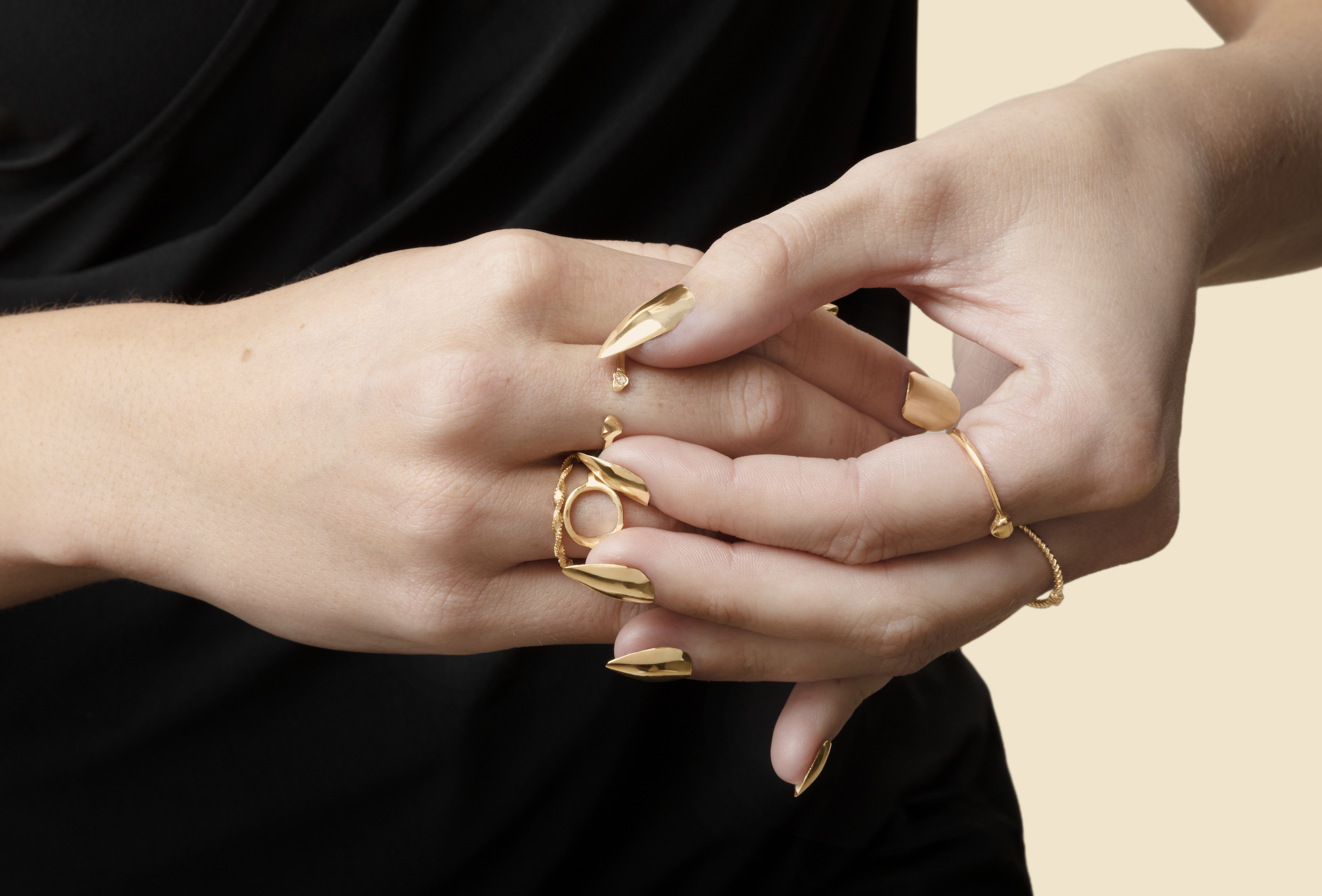 14k-gold-nails-model-hands-jewelry.png