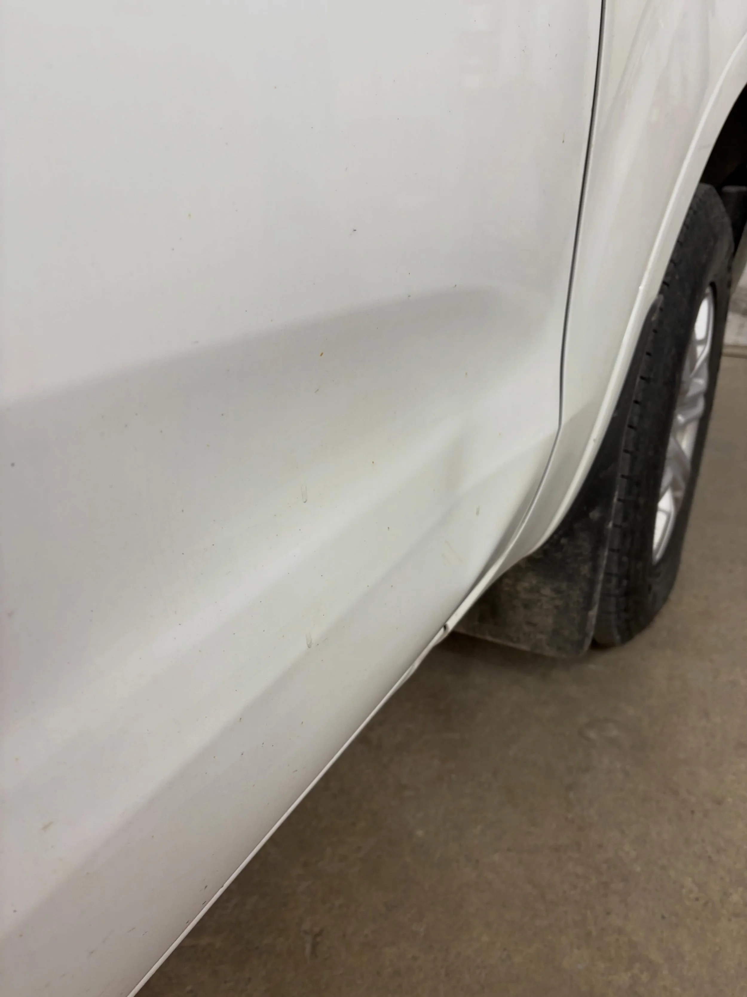 Large lower body line dent removed and factory paint left in perfect condition 👌