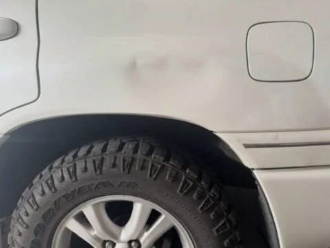 We saved this Lexus quarter panel from going to the body shop after a deer ran into the side of it