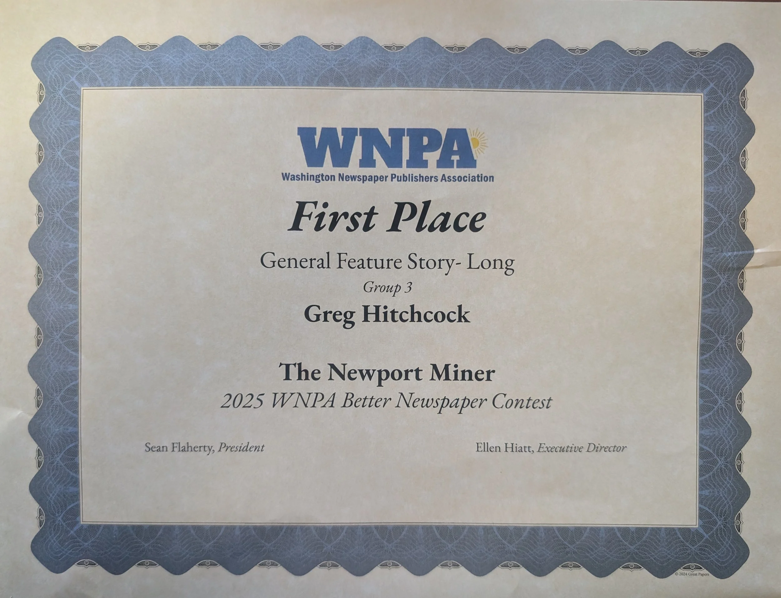 Certificate of first place awarded by the Washington Newspaper Publishers Association to Greg Hitchcock for best general feature story, long form, Group 3, titled 'The Newport Miner,' in the 2025 WNPA Better Newspaper Contest. Signed by Sean Flaherty, President, and Ellen Hiatt, Executive Director.