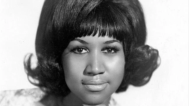 Aretha Franklin, legendary singer and influential woman in history whose music shaped culture and civil rights movements