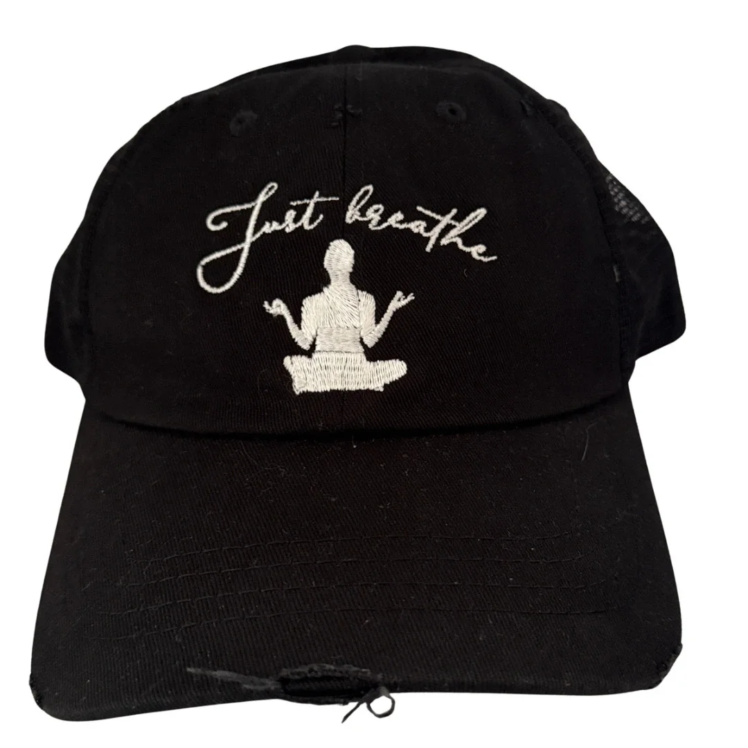 one-of-a-kind-just-breathe-black-distressed-trucker-hat-white-embroidery.webp
