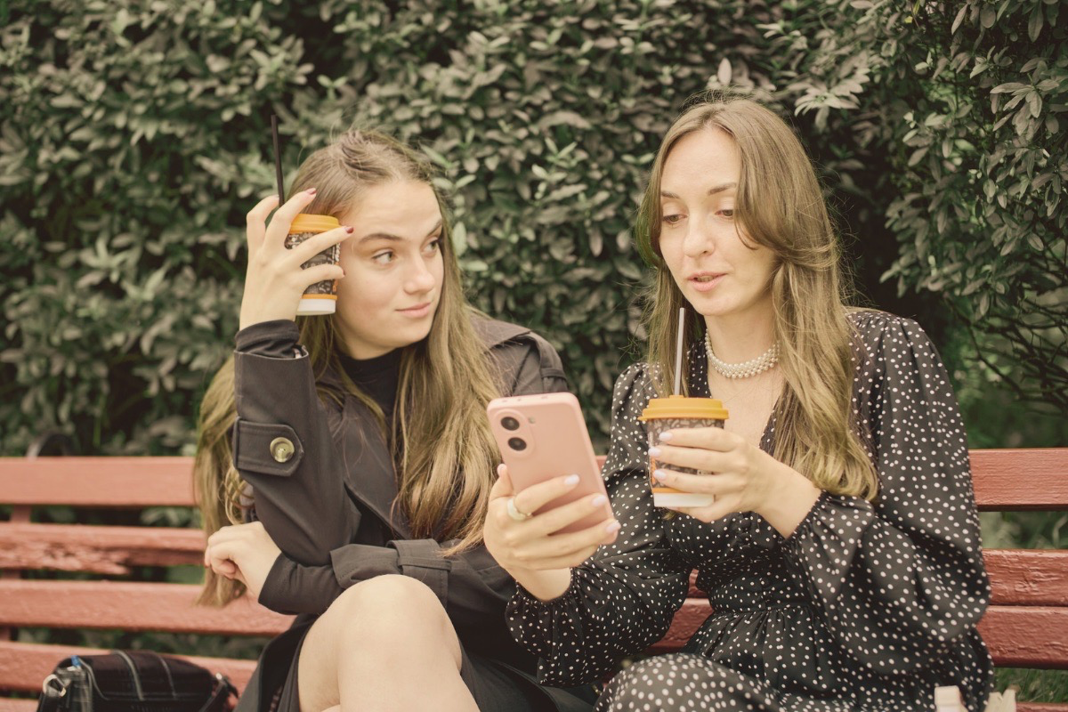 Two people sitting apart showing emotional distance and complex relationships