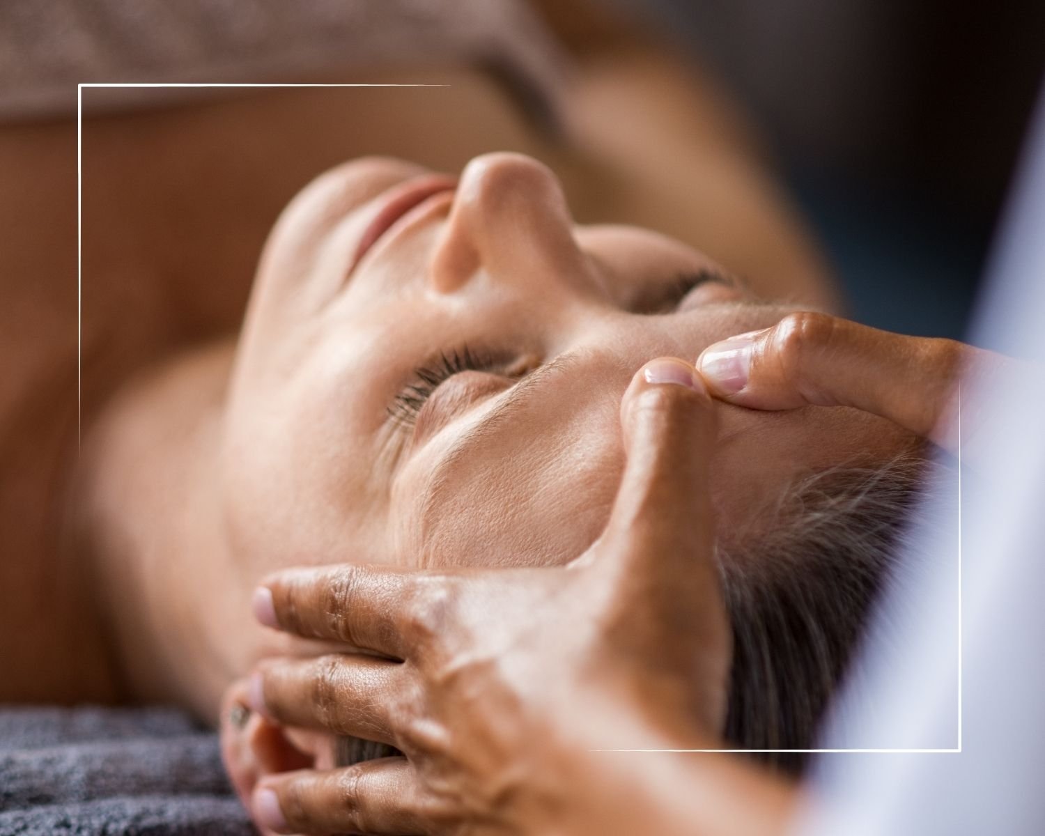 A close-up of a person’s face getting a facial