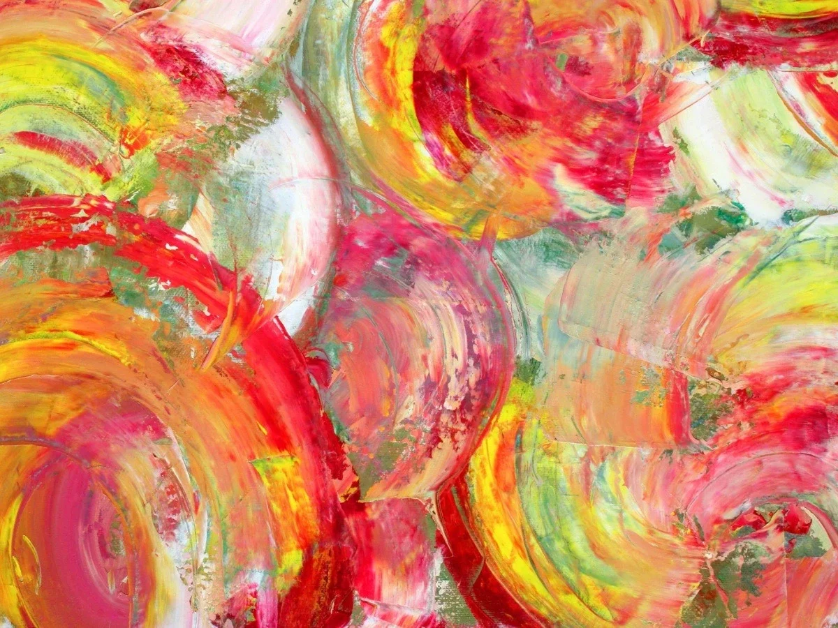 Abstract painting with sweeping circular brushstrokes in vivid reds, yellows, and greens, suggesting energy and movement
