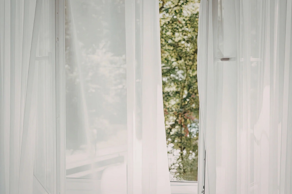 spring intentional living open window fresh air calm home