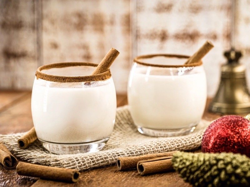 Traditional Puerto Rican coquito served with cinnamon for the holidays.
