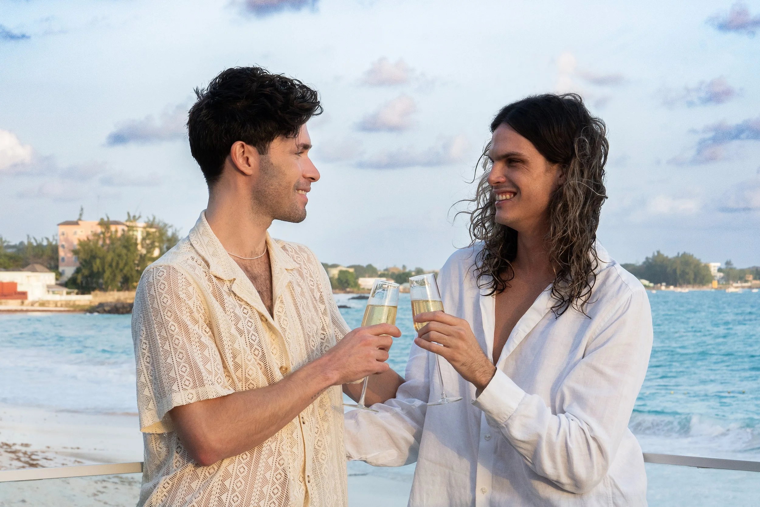SBZ_guys sharing champagne.jpg