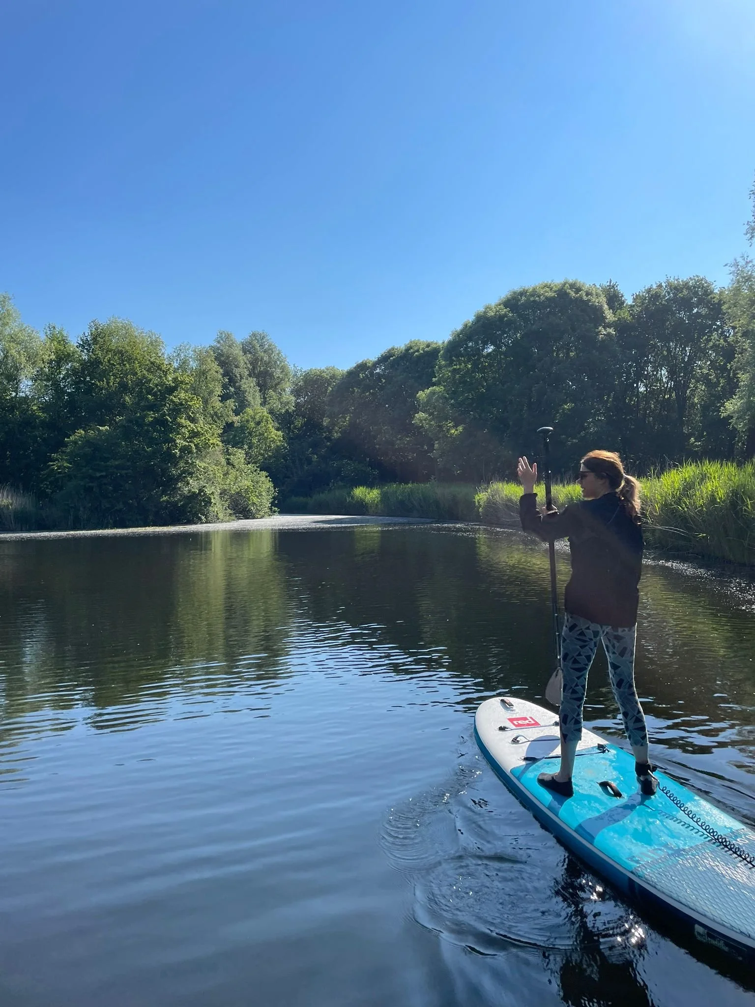 Sunrise SUP op de Sloterplas bij zonsopkomst in Amsterdam