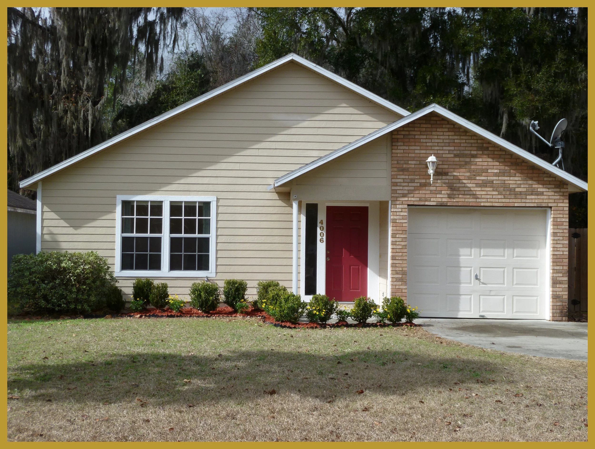 BrickGarageRedDoorHouseGoldFrame.jpg