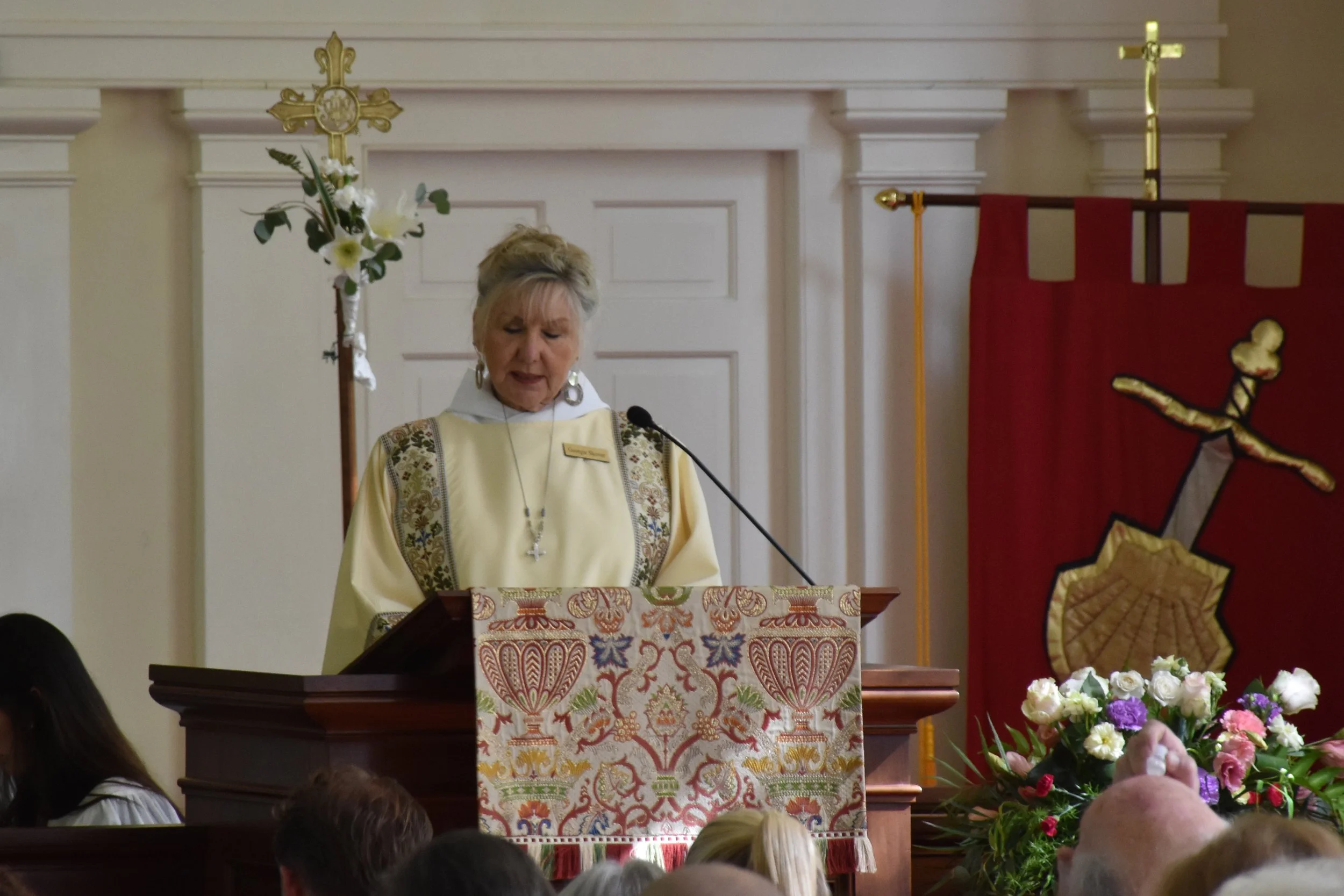 women lay reading at a church - lector charleston, SC