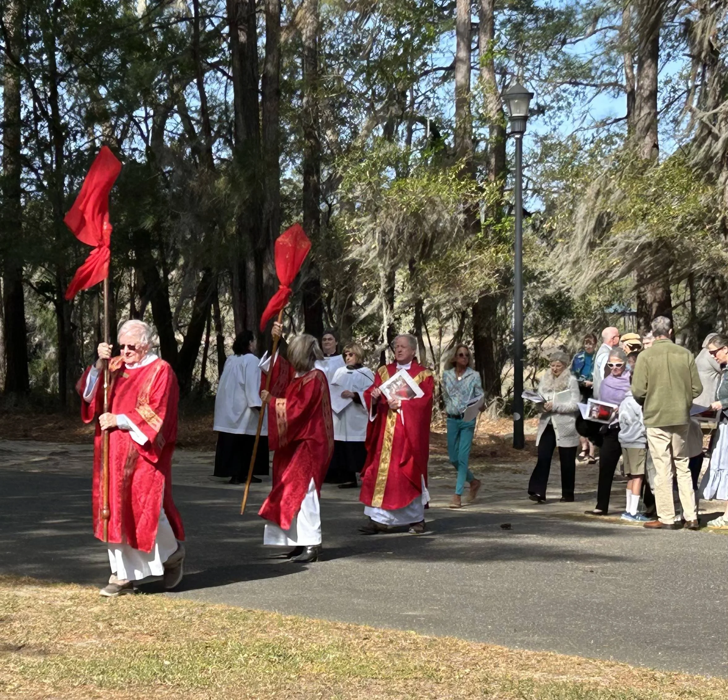 priest giving out communion