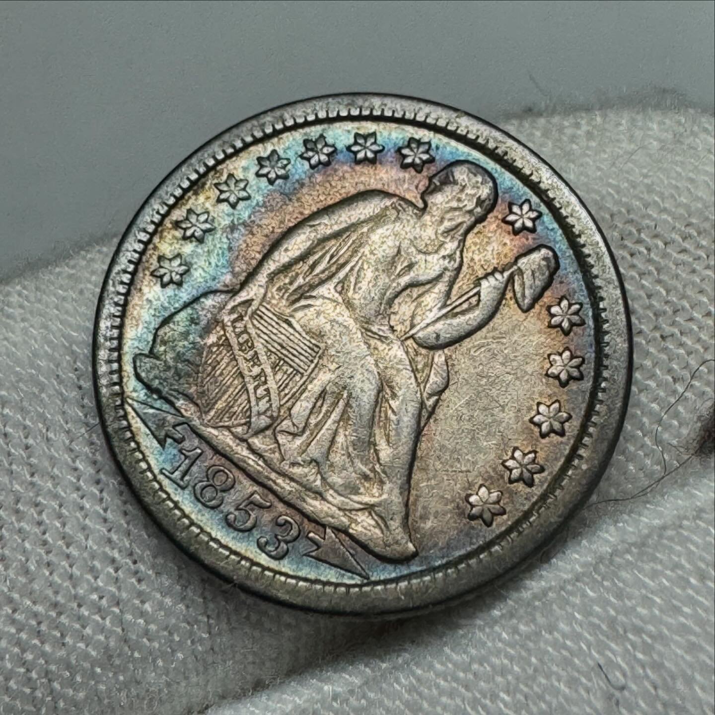 Beautiful 1853 Seated Dime we got in last week! Stunning icy blue toning to it! 

#CWCoins #SeatedDime #SeatedCoins #Numismatics #Silver #SilverCoins #Coins