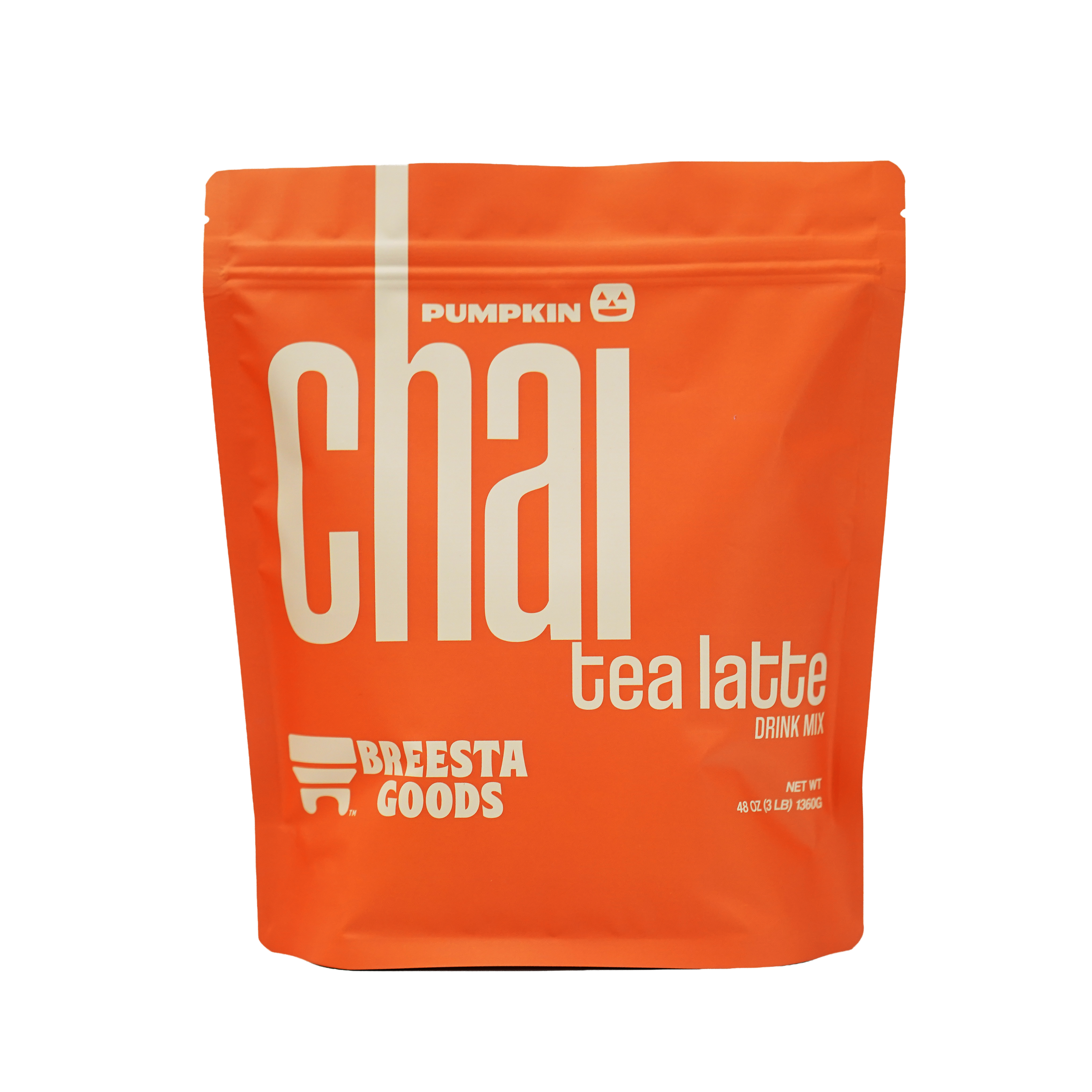 Close-up of orange packaging and the letters in white for Pumpkin Flavored Chai Latte Drink Mix, showing part of the label with brand logo and product description.
