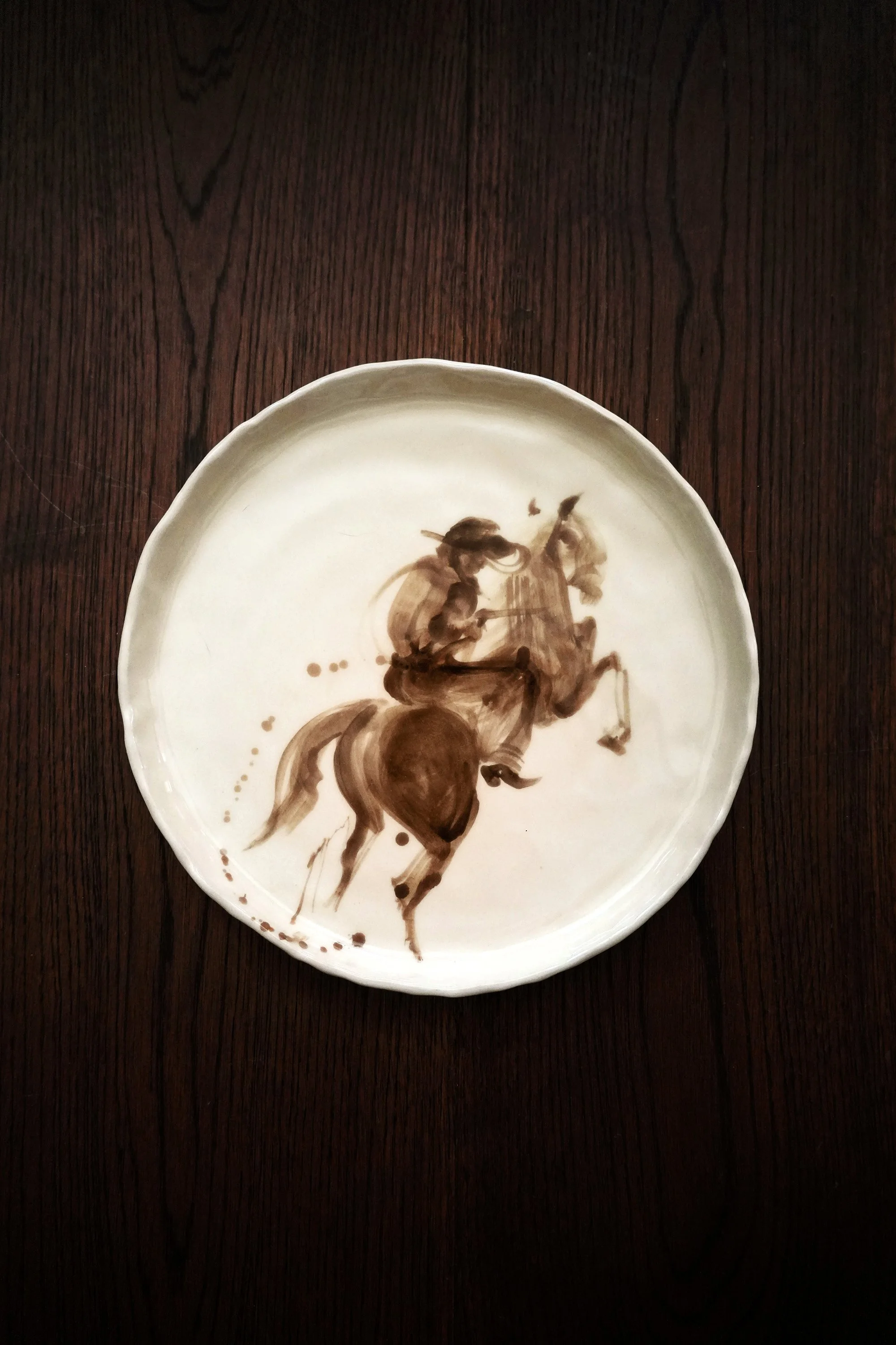 Cowboy on Buckin horse Plate by curiouscommon Western tableware & handmade ceramic dinnerware, hand-painted with cowboy on a bucking bronco horse rodeo art