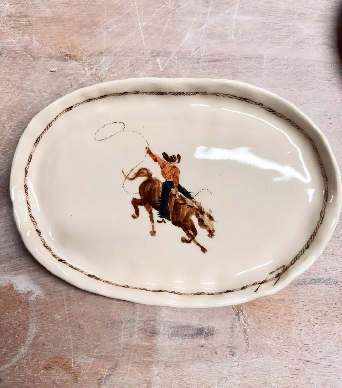 Cattleman rides at the break of dawn, dusty rose at pale light, a steady horse carries him &mdash; ready for work. The sounds of trotting hooves and dust beneath the whips of air roped from his swinging lasso&hellip;

&mdash; White Draycott Oval Serv