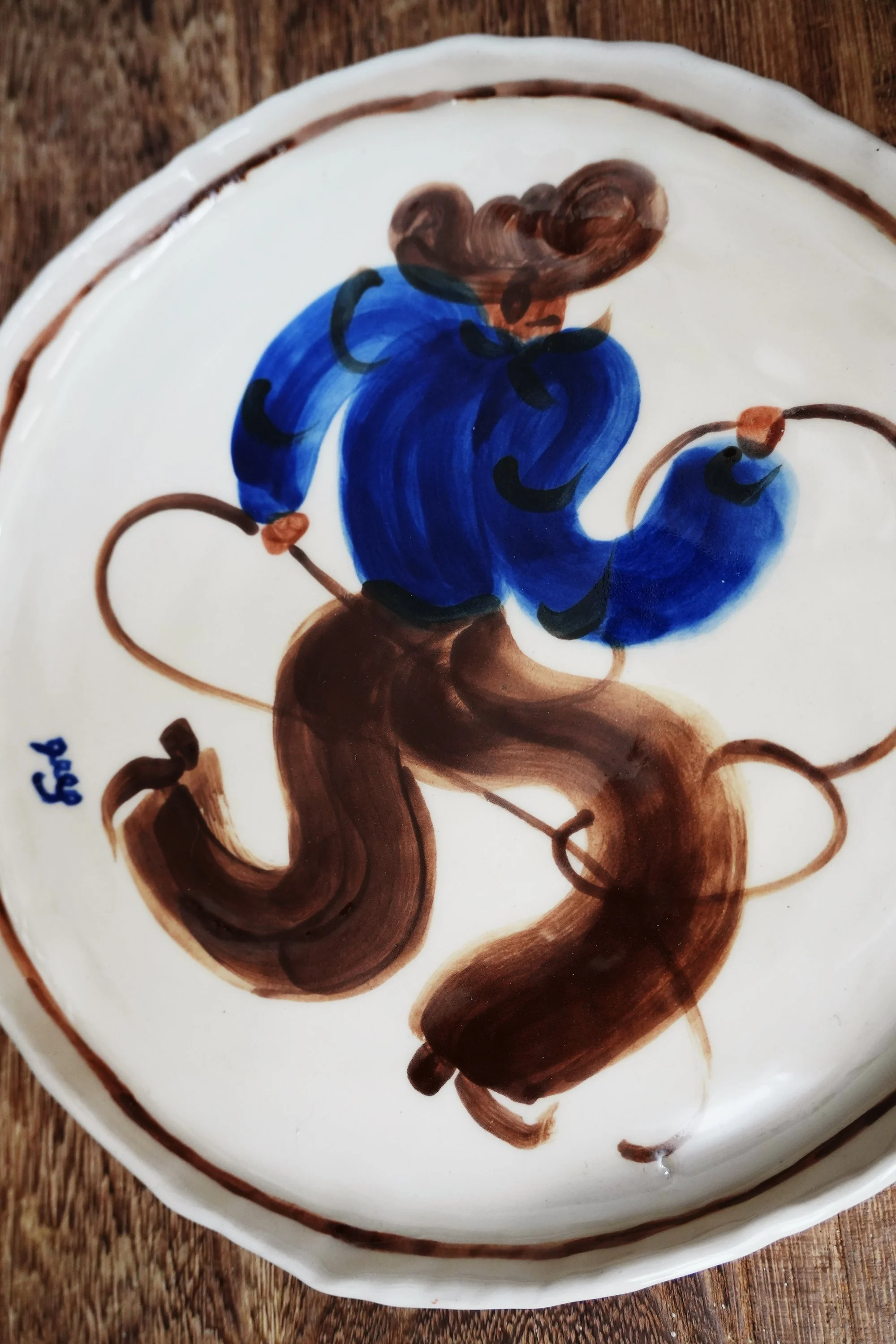 Handpainted Blue Cowboy Ceramic Plate by Curiouscommon.jpg