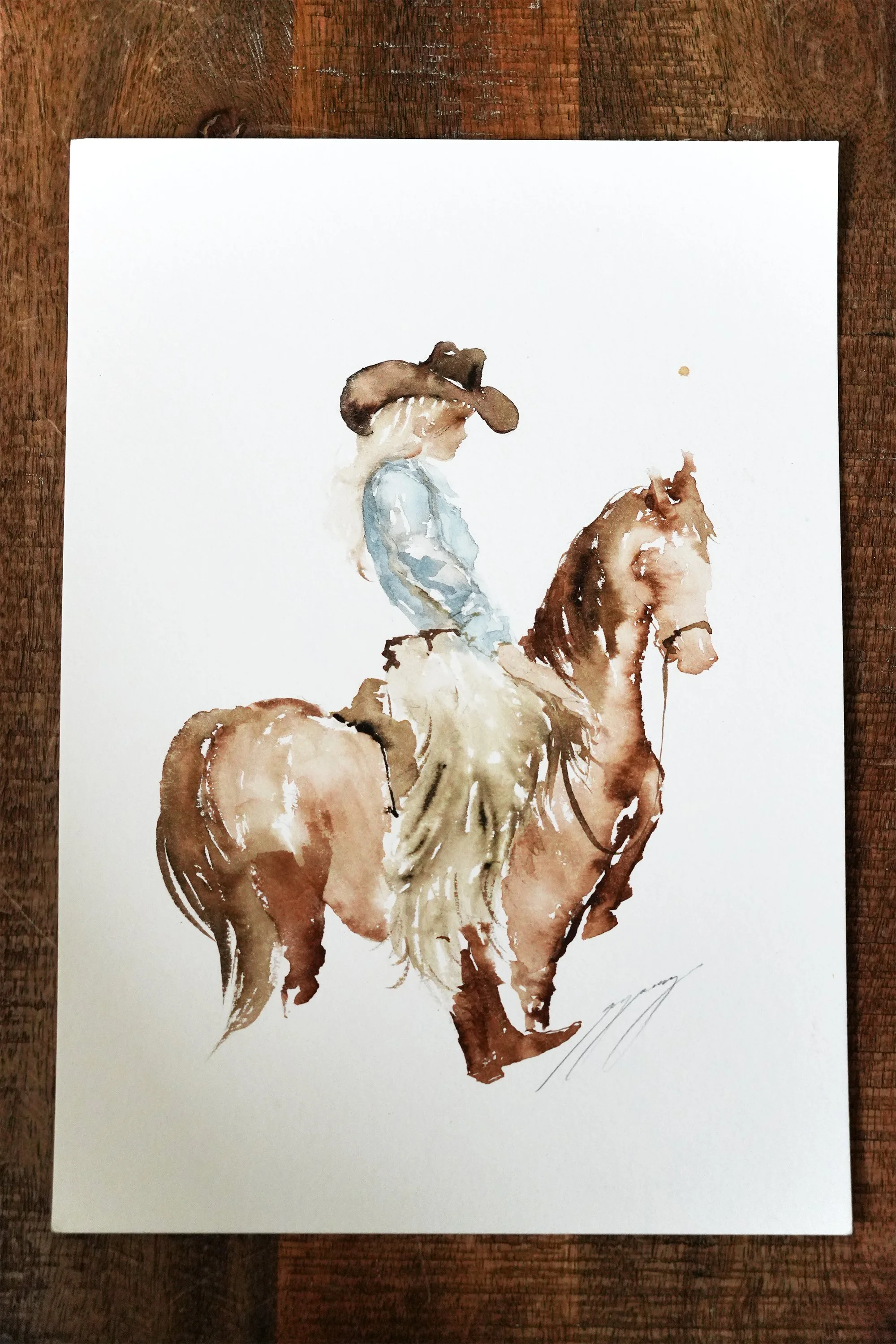 Blonde Horseriding Cowgirl in Chaps painting by Robyn Yeang.jpg