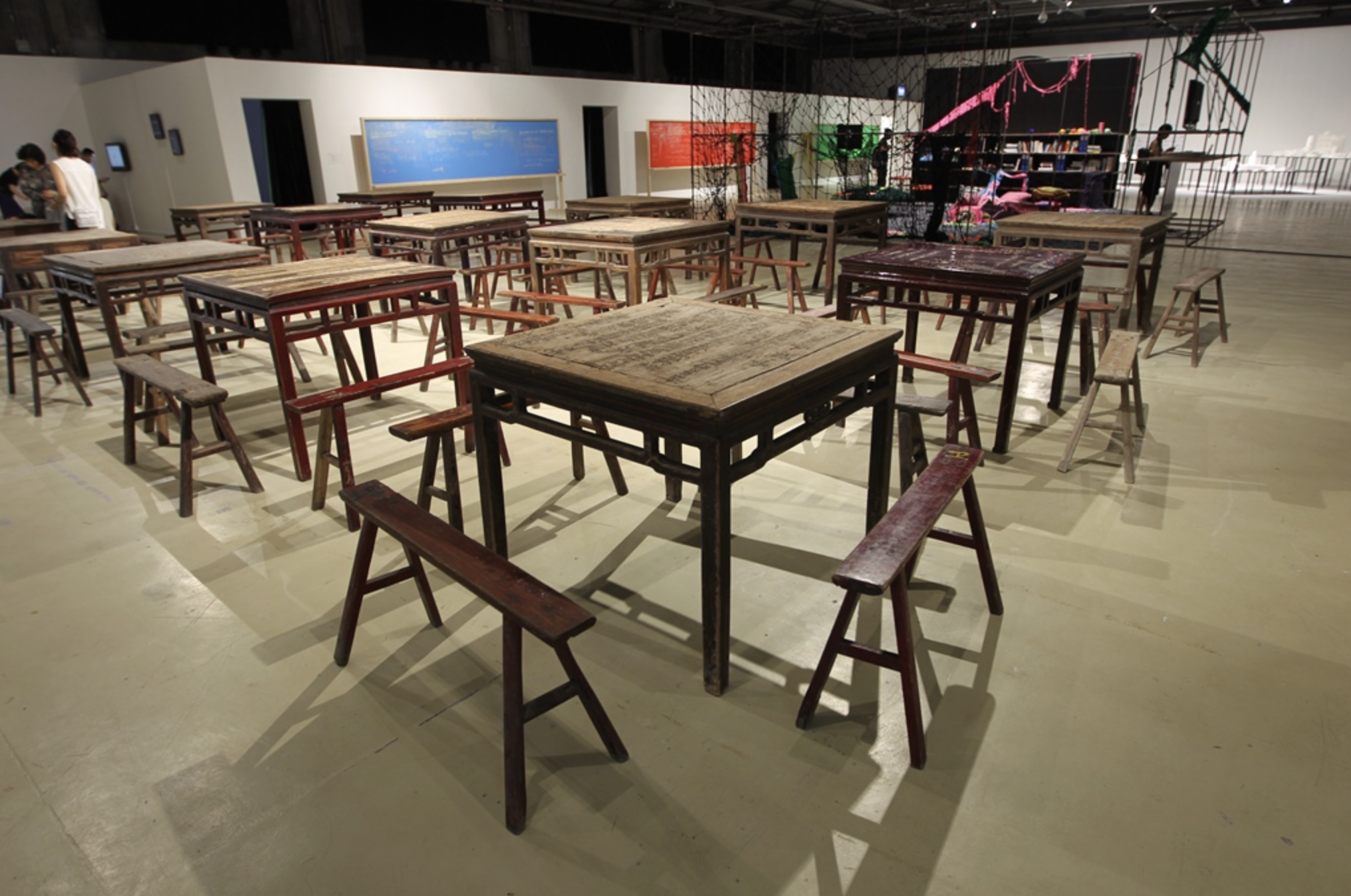 Qiu Zhijie and Song Zhen with Diankou residents and Total Art Studio, “The Society – Diankou Villager Furniture”, installation, 15 carved tables and 60 chairs, 2012