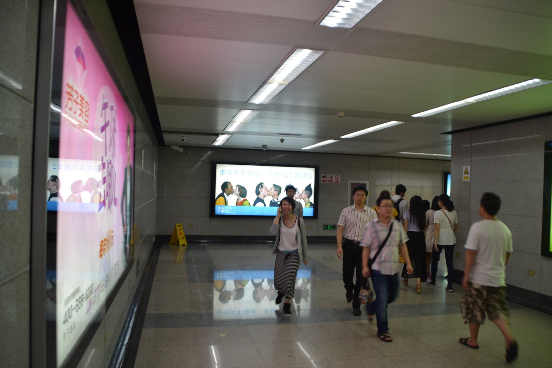 Gran Fury, Kissing Doesn’t Kill, 1989, remade 2014. Poster in lightbox, Shenzhen Metro.