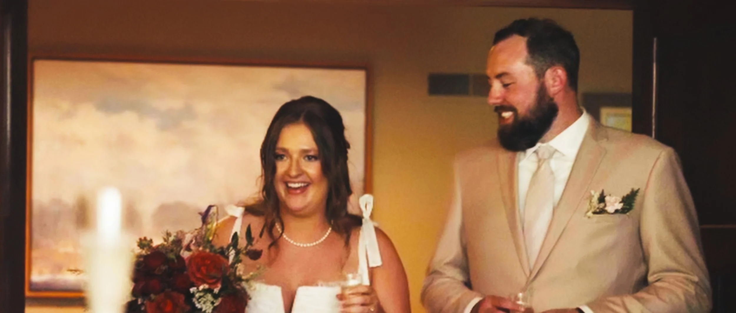 Bride and groom smiling together indoors during wedding day in Lincoln Nebraska reception moments