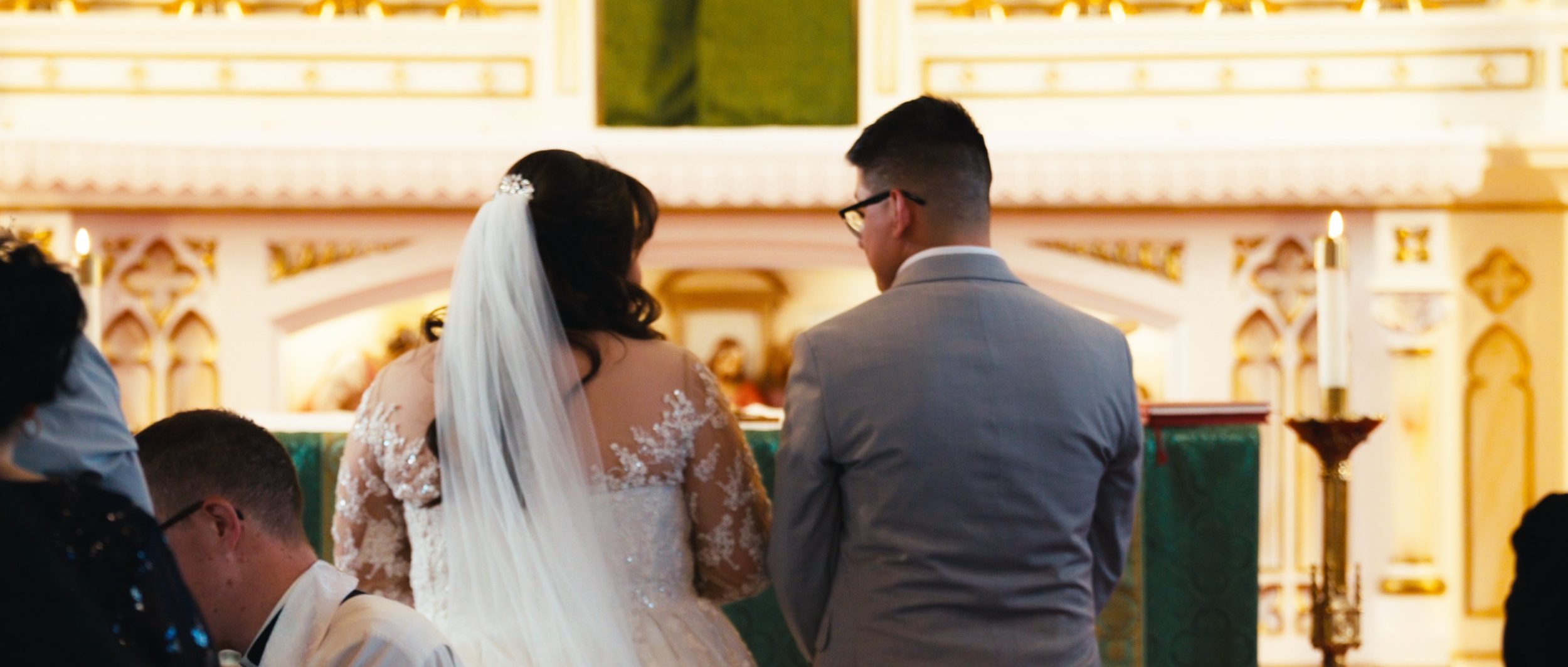 Bride and Groom at the Altar During Catholic Wedding Ceremony in Norfolk