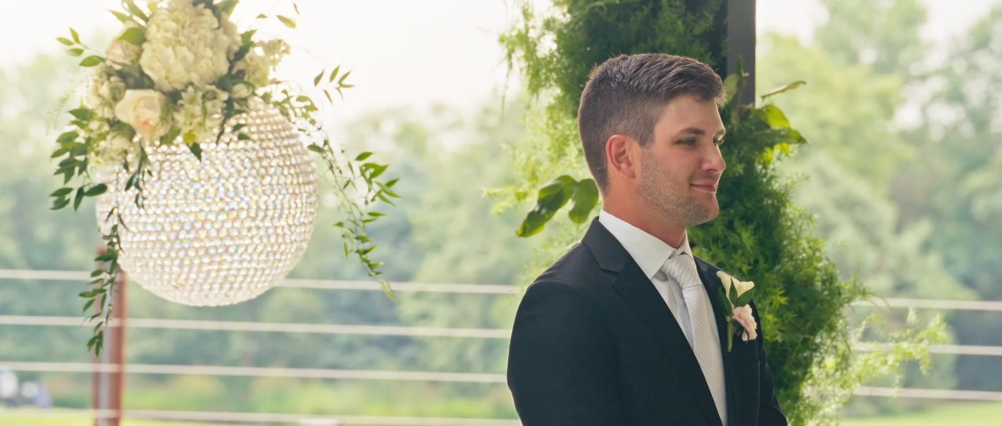 30-outdoor-ceremony-chandelier-floral-details.jpg