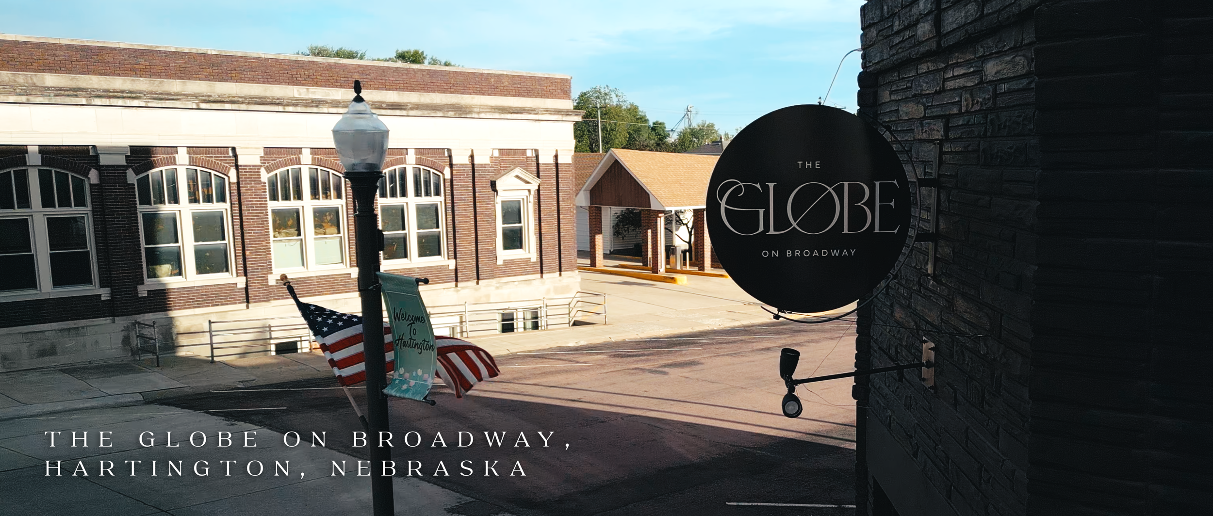 the-globe-on-broadway-groom-wedding-prep-hartington-nebraska-exterior_02.png