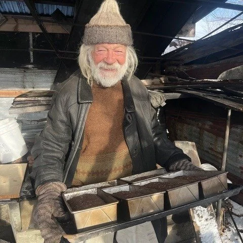 Bread and Puppet Theatre, Glover, Vermont 

Peter Schumann took 40 loaves of rye bread out of his wood fired oven after they had been in the oven for 24 hours. An initial burst of heat from the pine wood gave way to warm temperatures for the balance 