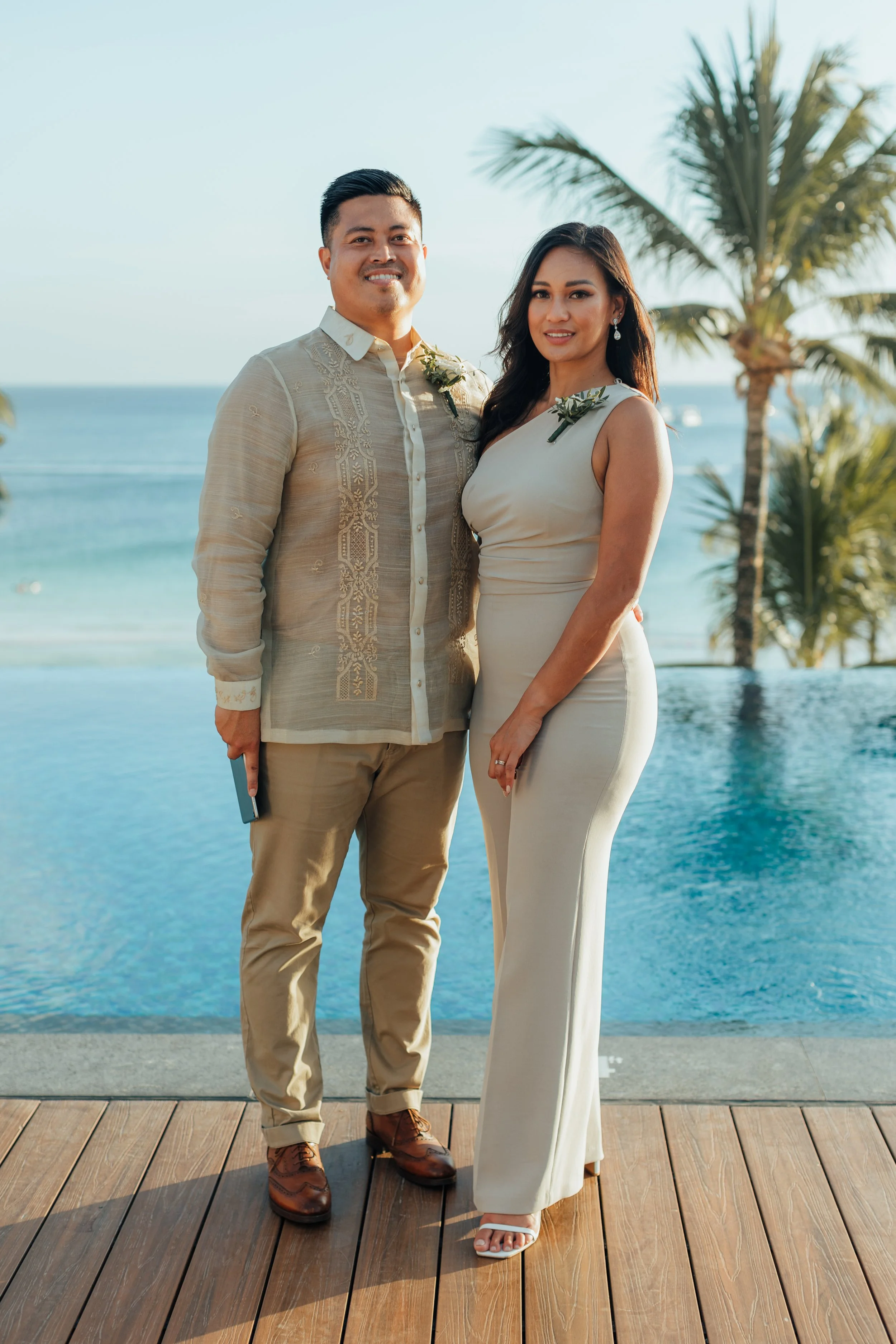 Intercultural Couple Standing and Smiling Together