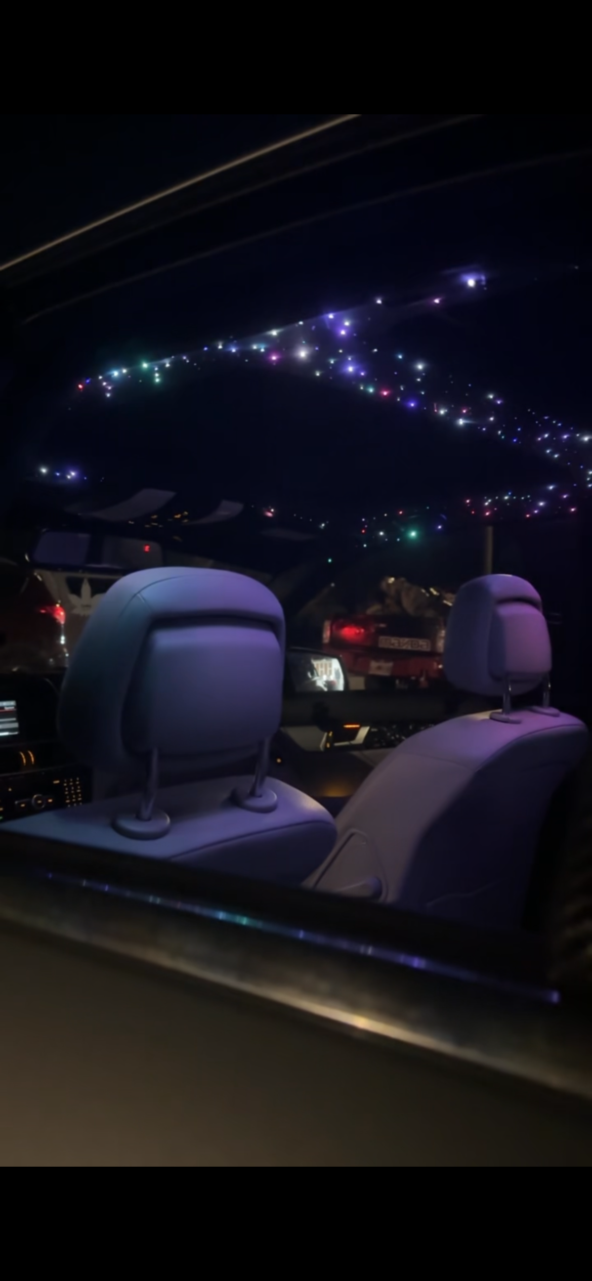 Starlights installed in a car headliner, interior shot