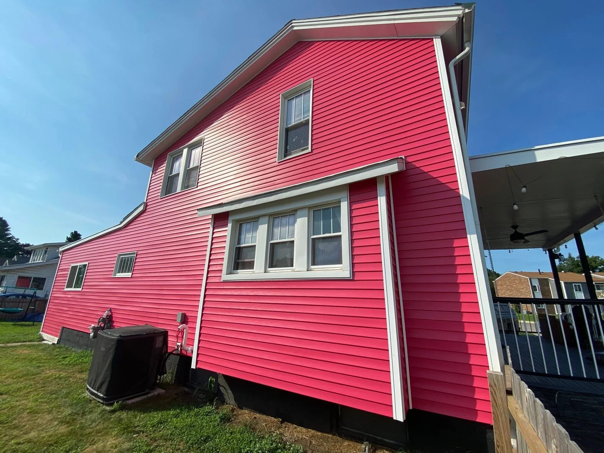 Exterior house painting in Monroe County Michigan by Consumer Painting Company