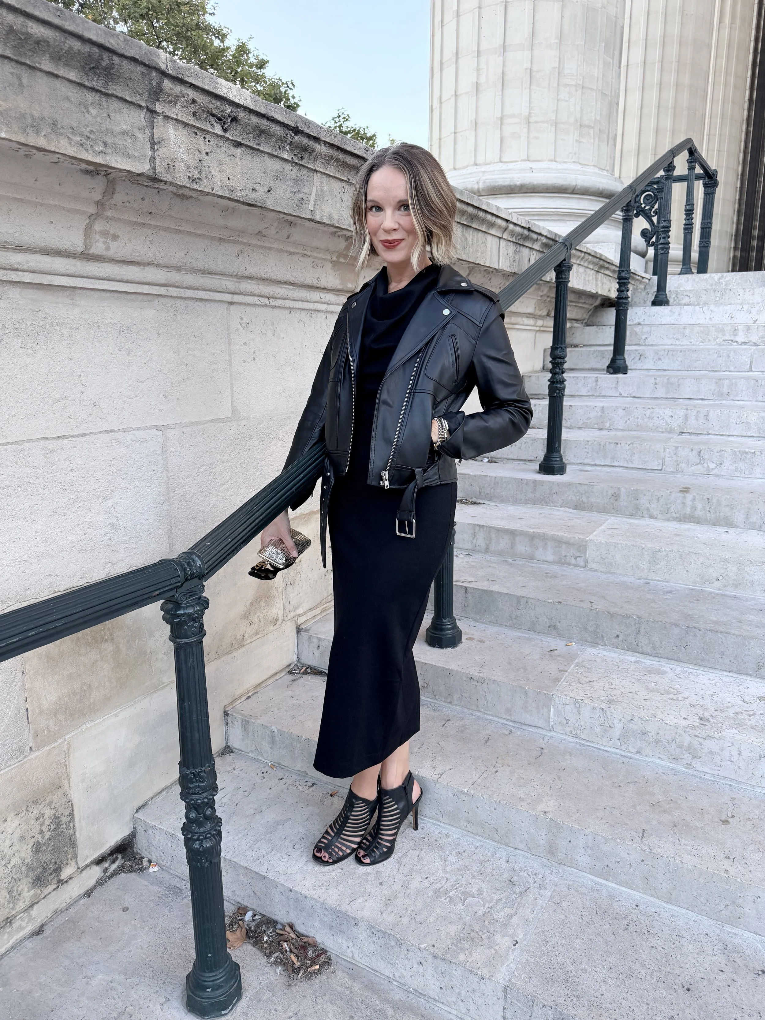 with caged heels and a leather jacket