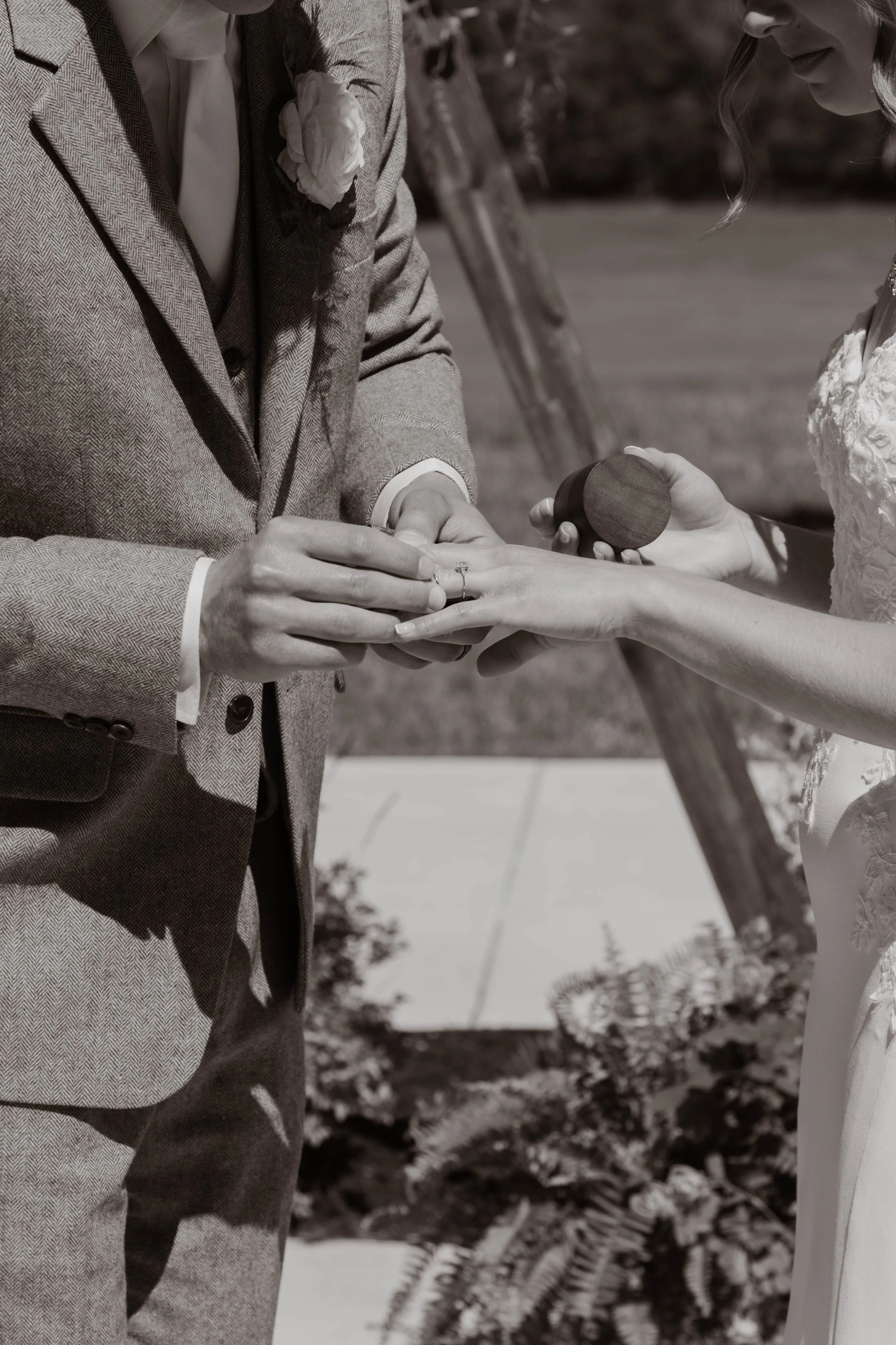 Bride and Groom Putting on Wedding Rings (1).jpg