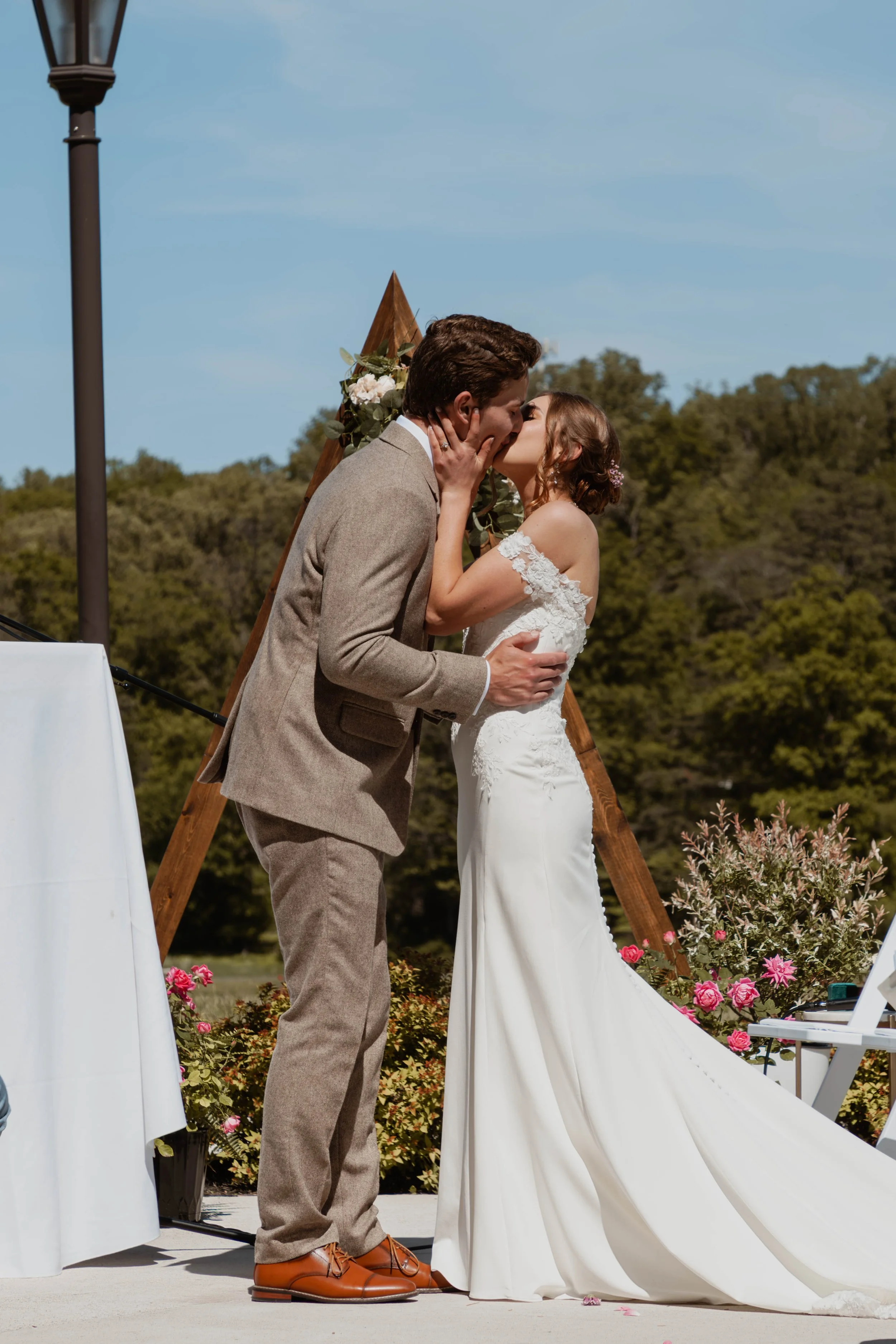Groom Kissing the Bride on Wedding Day.jpg