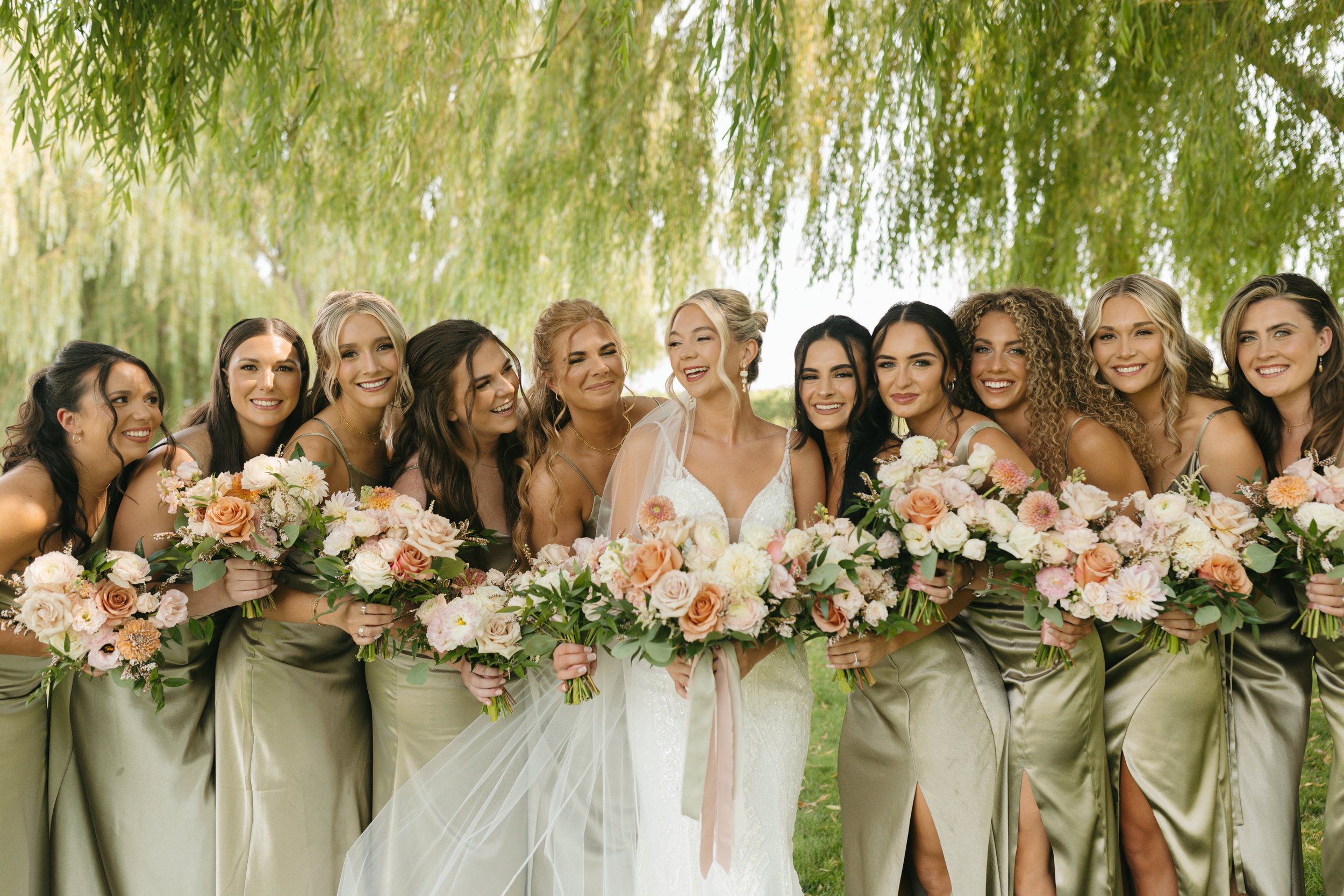 Soft blush, peach, and sage wedding with roses, poppy pods, calcynia, eucalyptus, ranunculus, dahlias at Gooseridge Winery Park Benton City WA