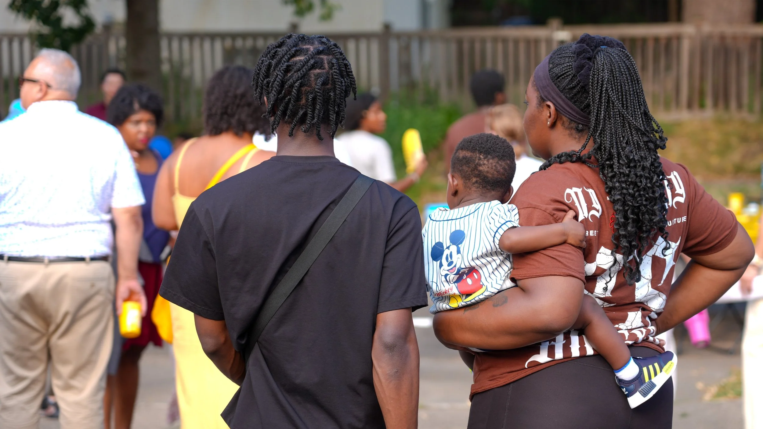 Family Watching Crowd .jpg