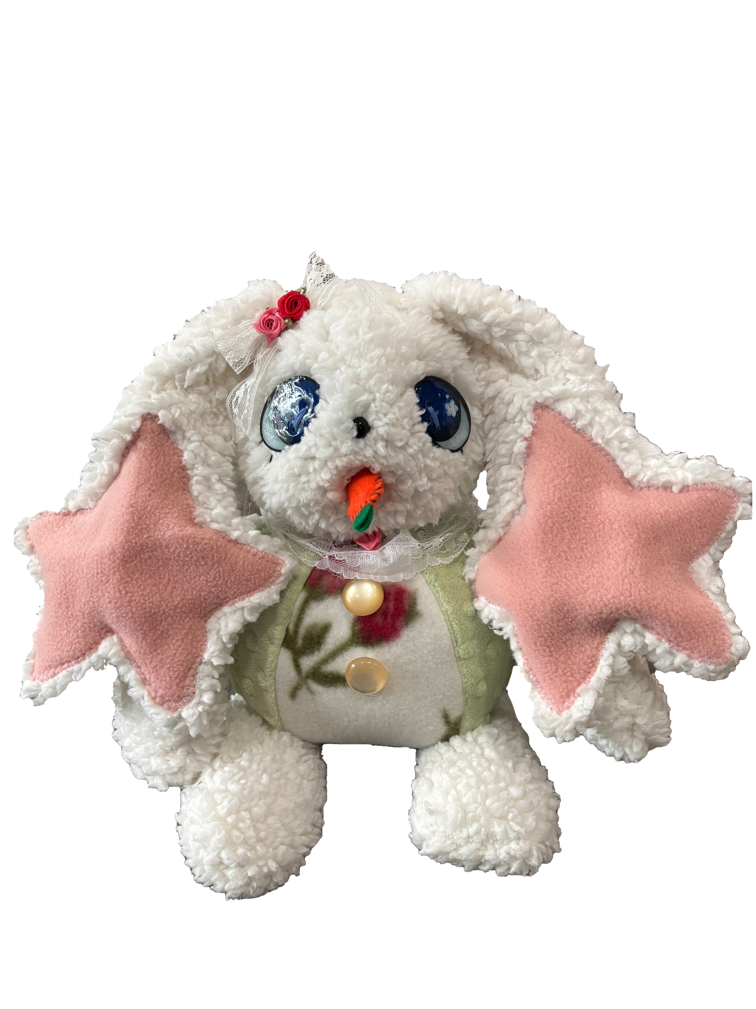 A plush toy resembling a bunny dressed as a fairy princess with a white fluffy body, pink star-shaped wings, and a head decorated with a lace bow and pink roses.