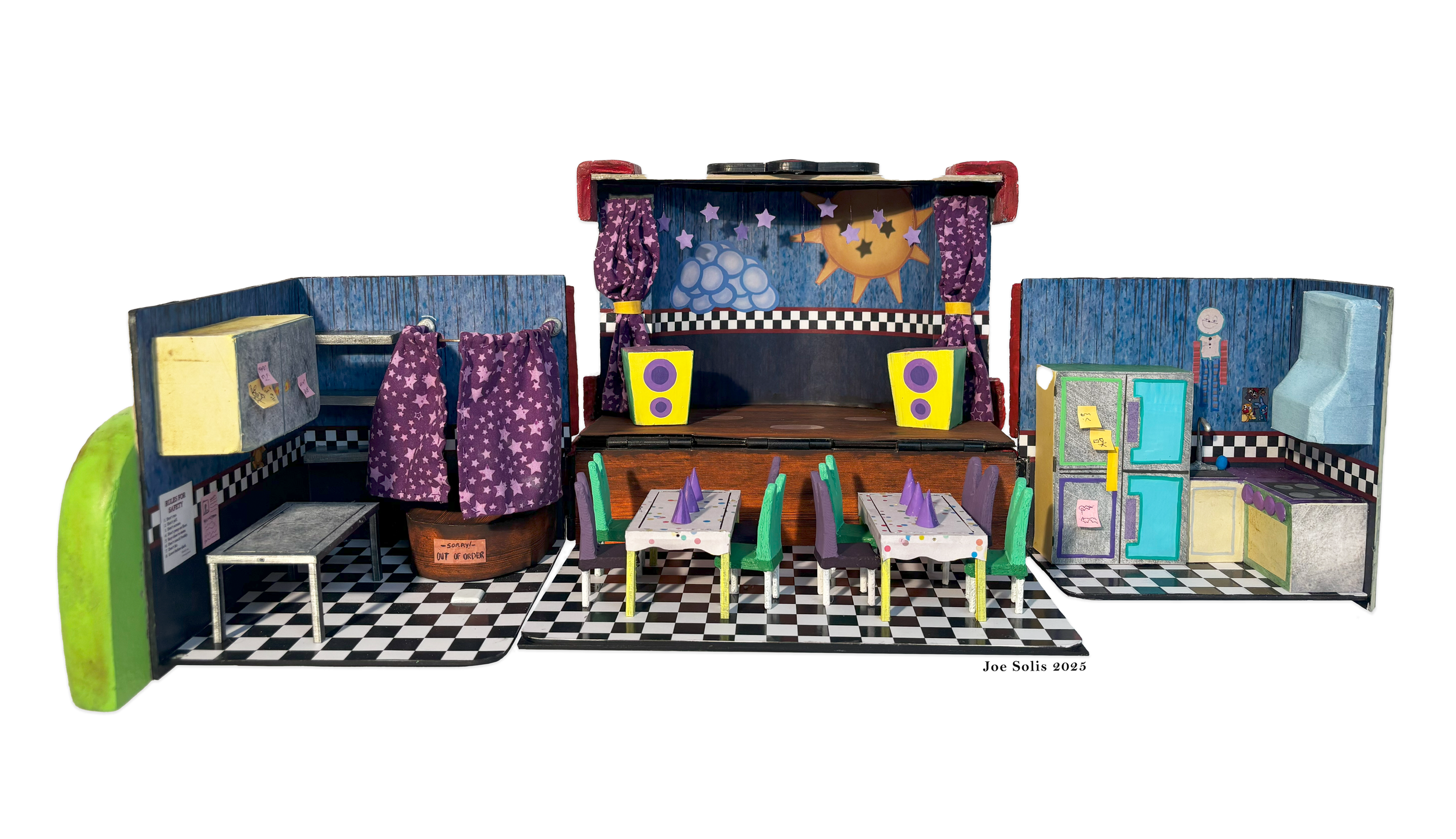 Miniature stage set of a colorful, cartoon-style restaurant or cafe with tables, chairs, and a stage with purple curtains, decorated with planets and stars, and black-and-white checkered flooring.