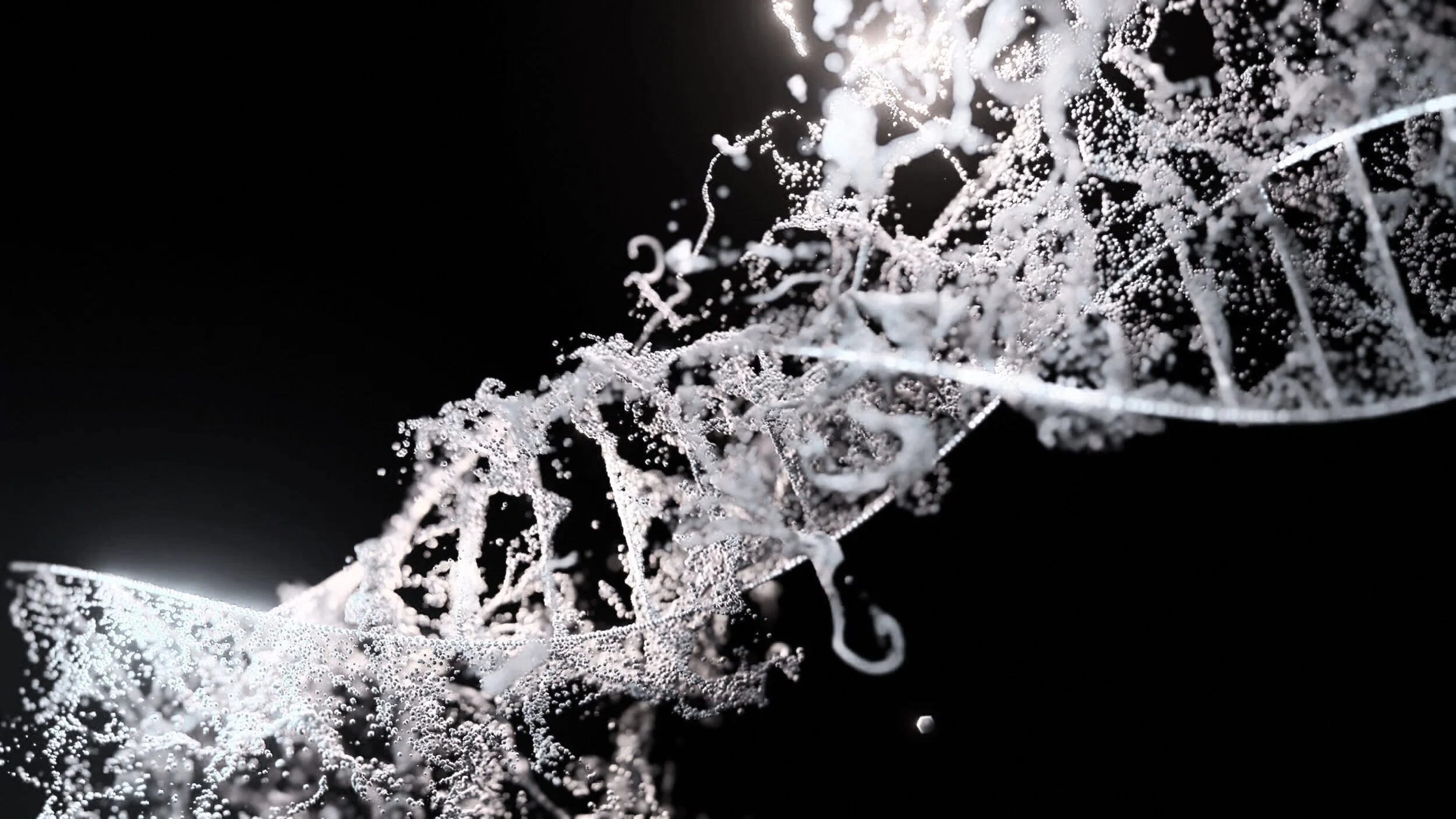 Close-up of a DNA double helix structure with water droplets on it, illuminated against a black background.