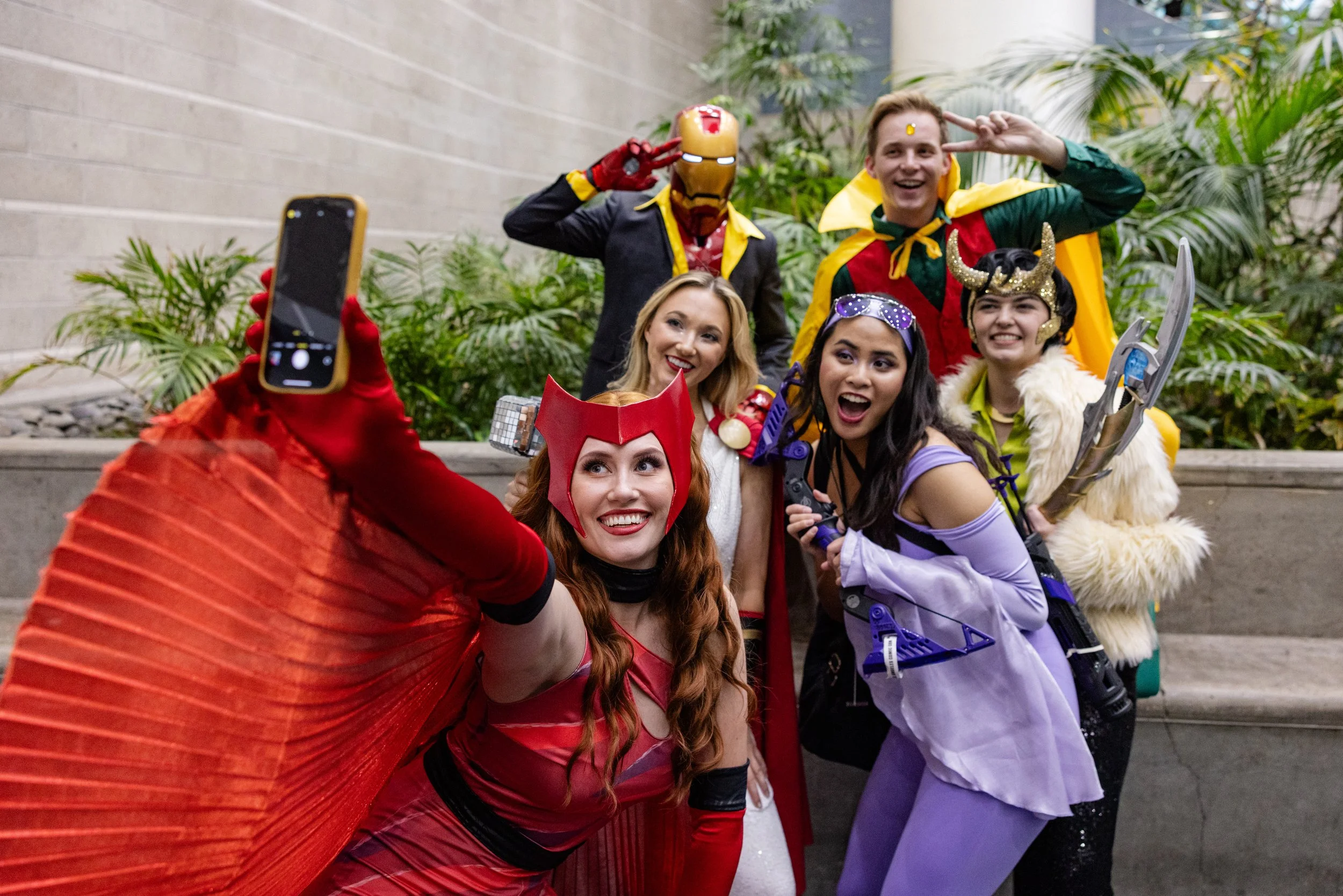A group of cosplayers posing for a photo