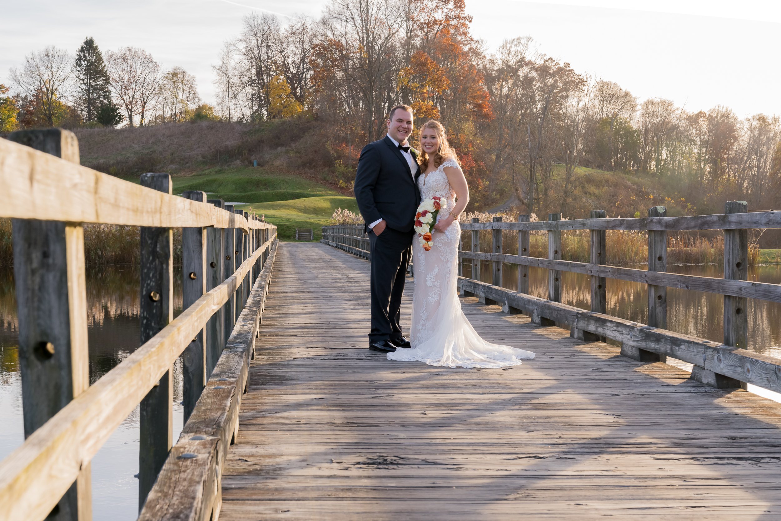 couple at the bridge at Hollow Brook Club Wedding