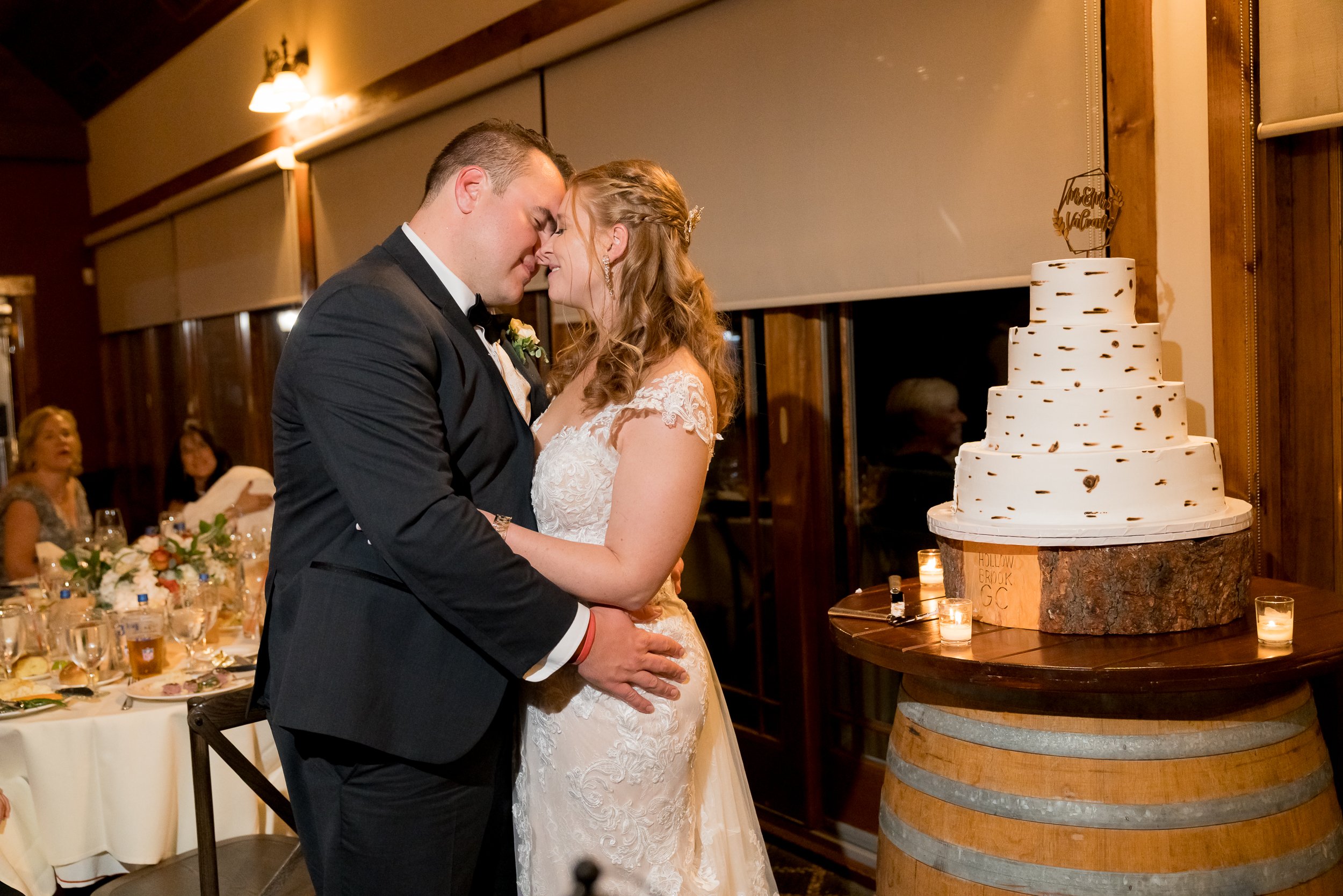 Bride and groom kissing at Hollow Brook Club Wedding