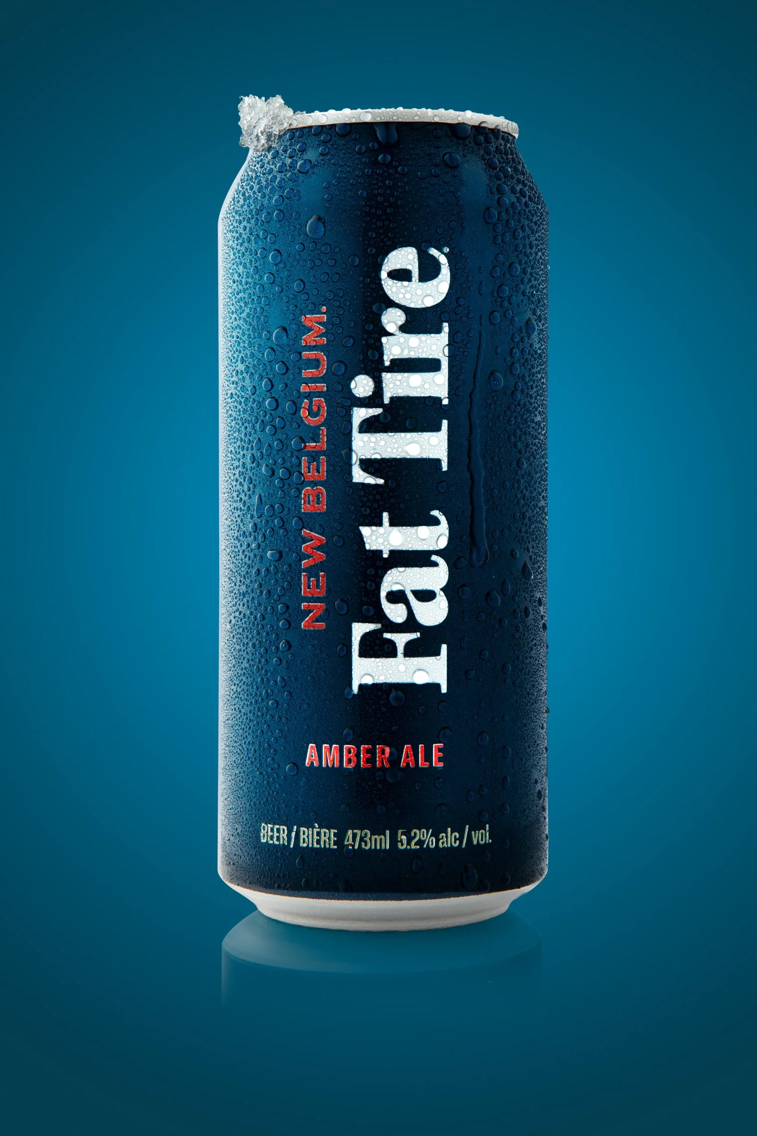A can of Labatt Amber Ale with condensation, featuring a blue background and white and red text.