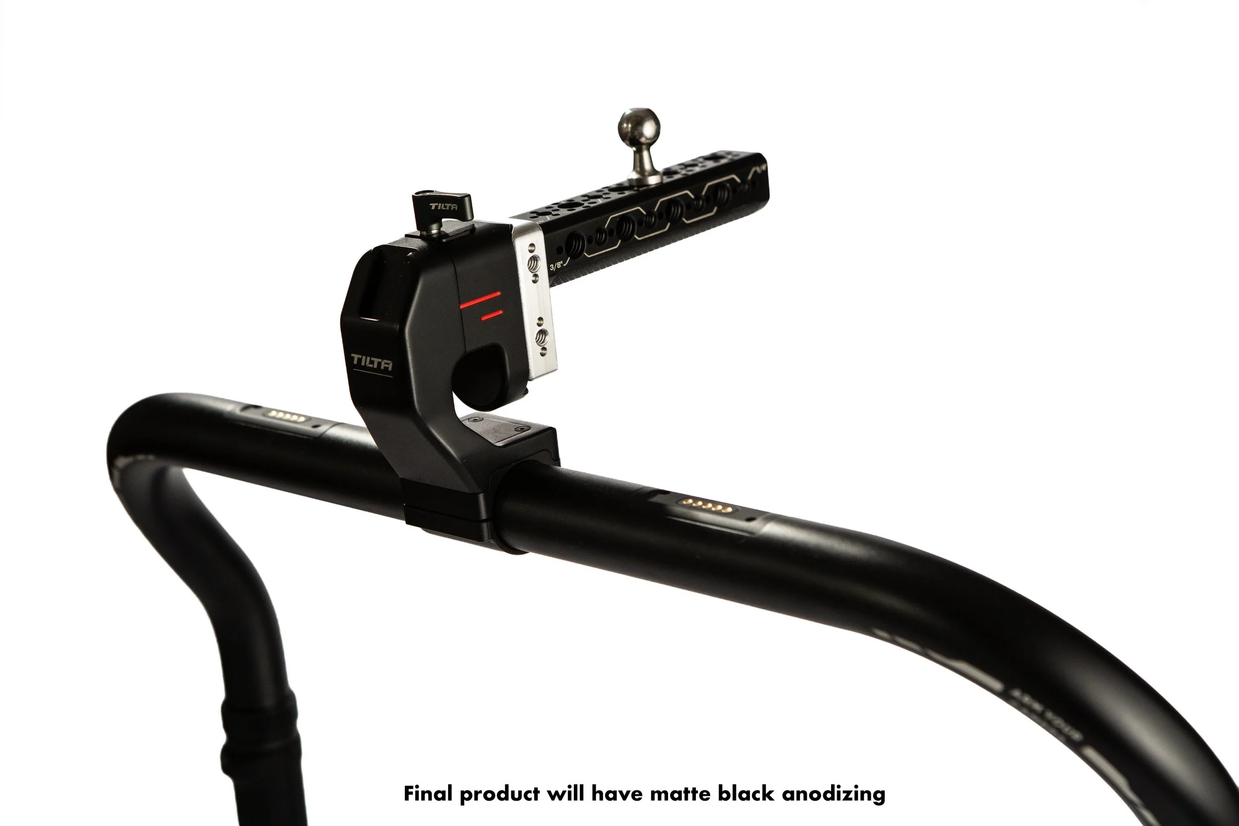 The Tilta Ring Handle Starter is a precision-machined aluminum upgrade for the Tilta Advanced and Basic Ring Grips. Replacing the DJI battery with a compact mini cheeseplate, it features two 3/8"-16 a