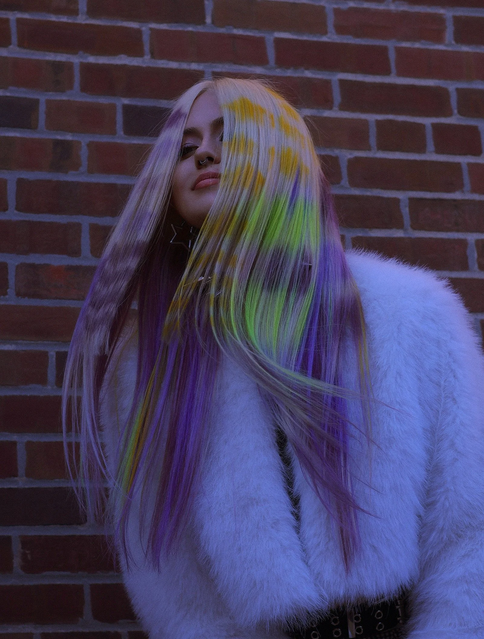 Wig styled in a detailed star pattern, handpainted on a 22 inch length unit.