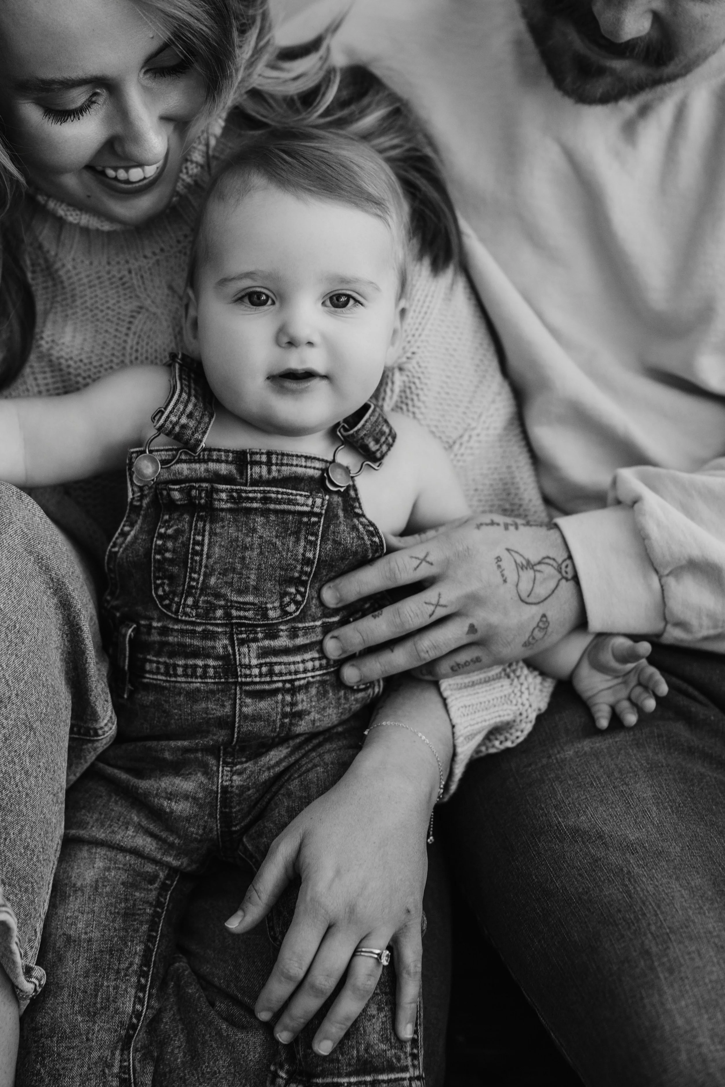 studio family close up with hands on baby, snuggly photography birmingham al